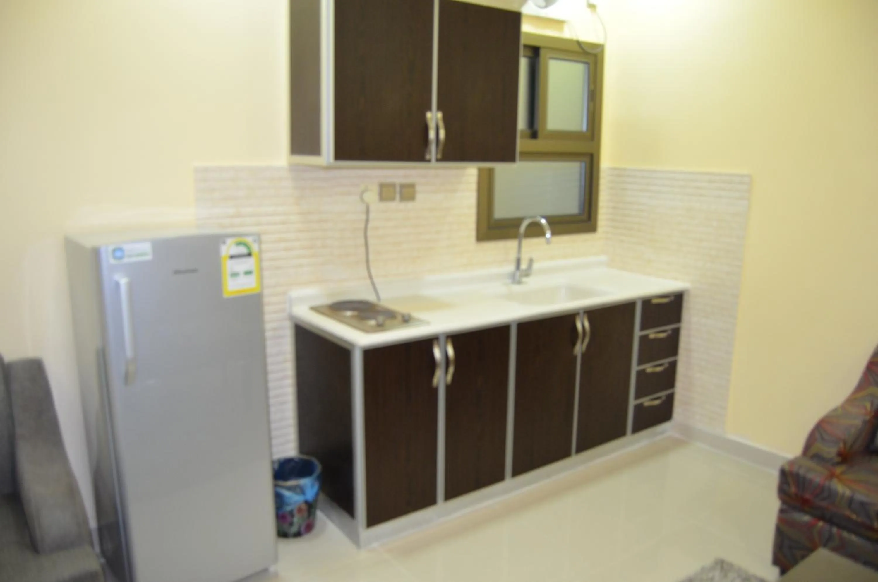 Kitchen or kitchenette in Aros Al Faisaliah Furnished Units