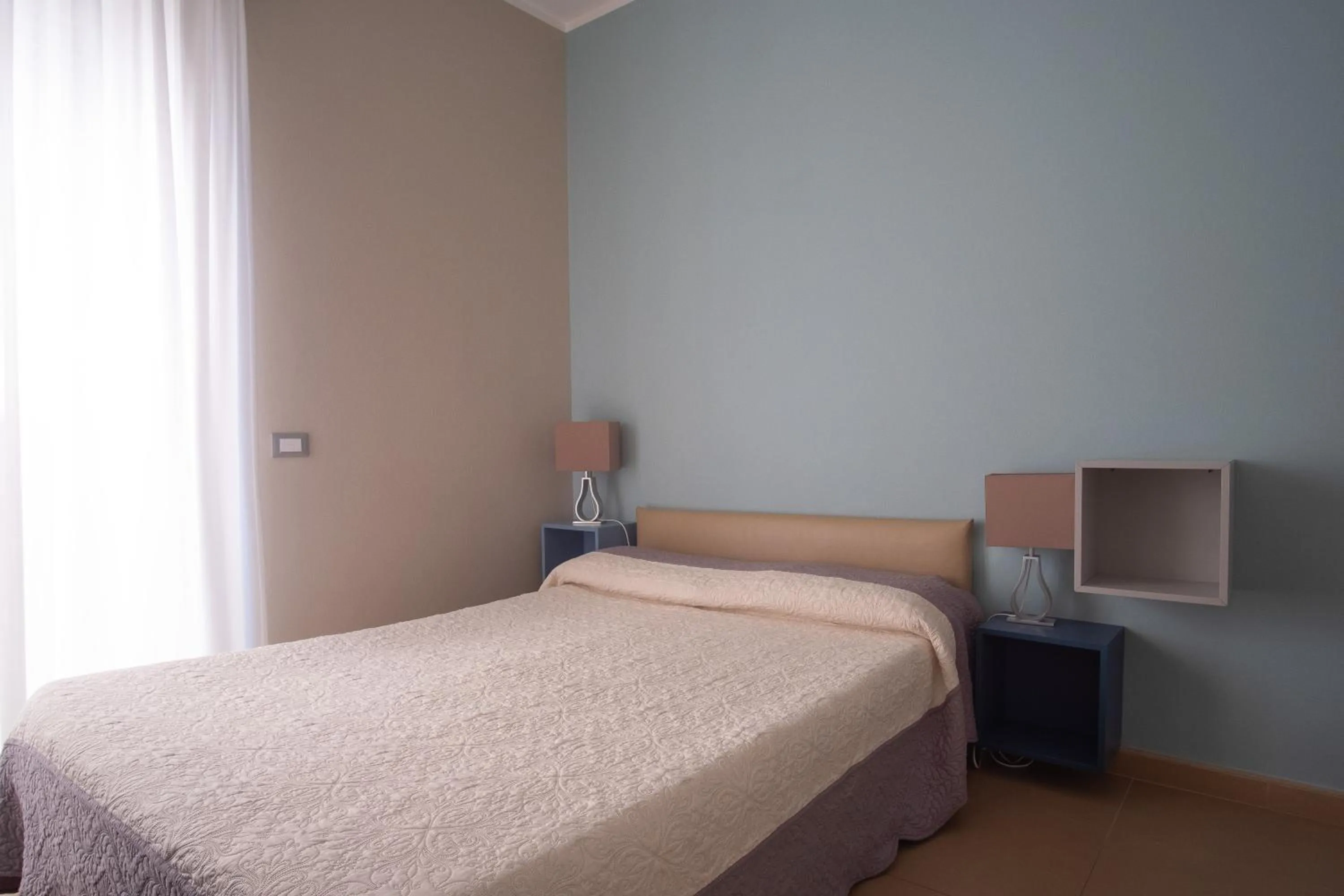 Bed in Residence Sole Mare Alaxi Hotels