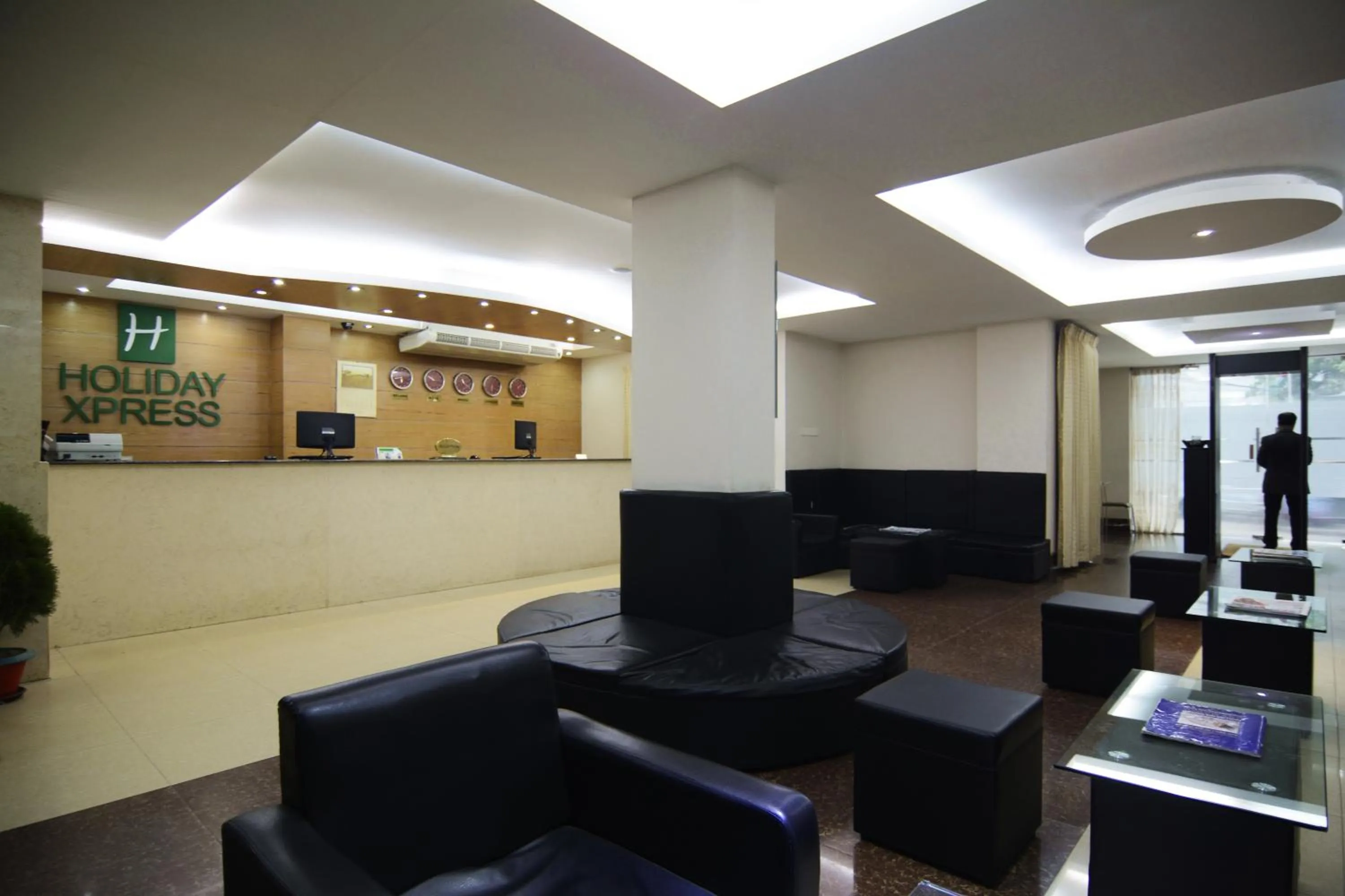 Property logo or sign in Holiday Xpress