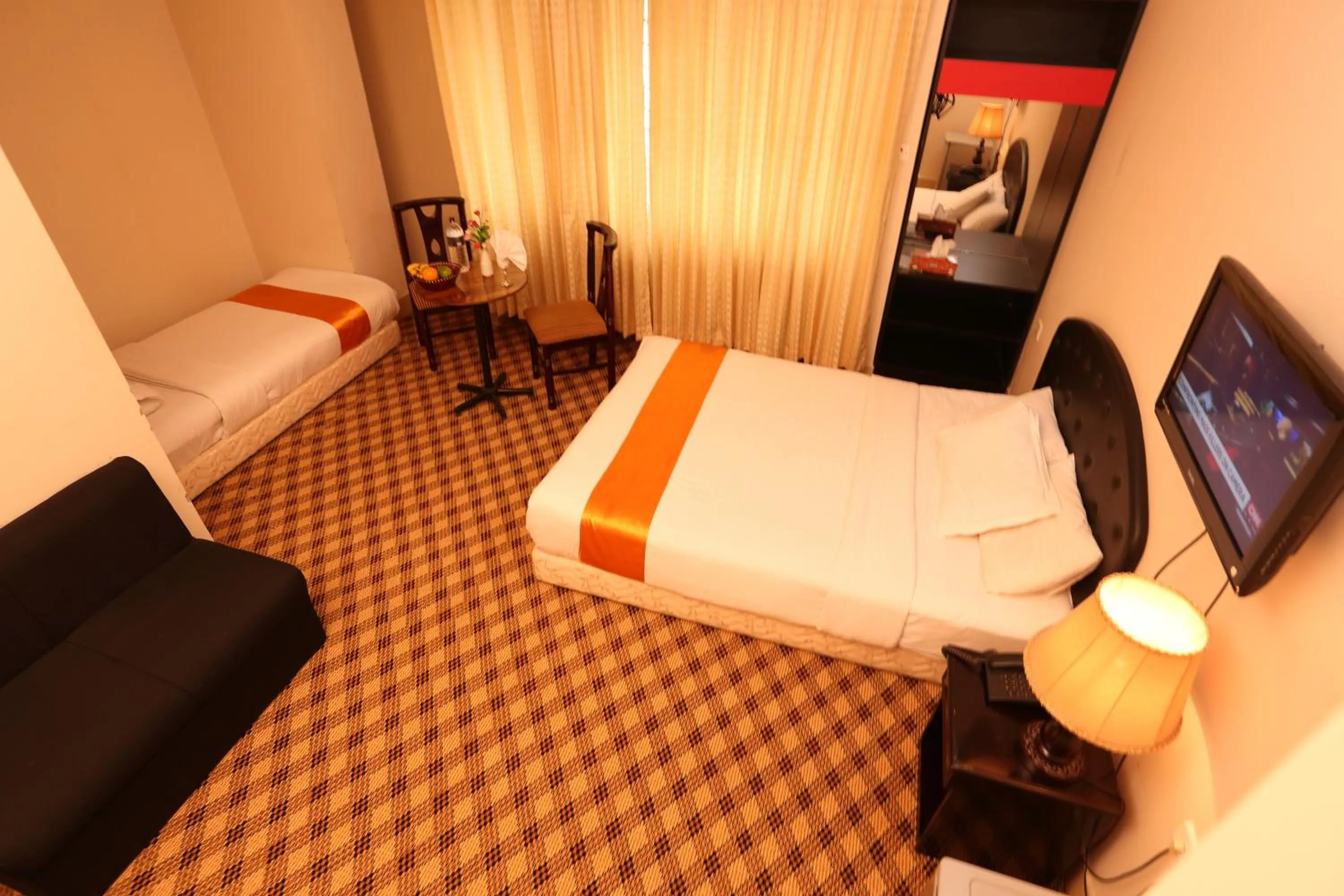 Photo of the whole room, Bed in Holiday Xpress