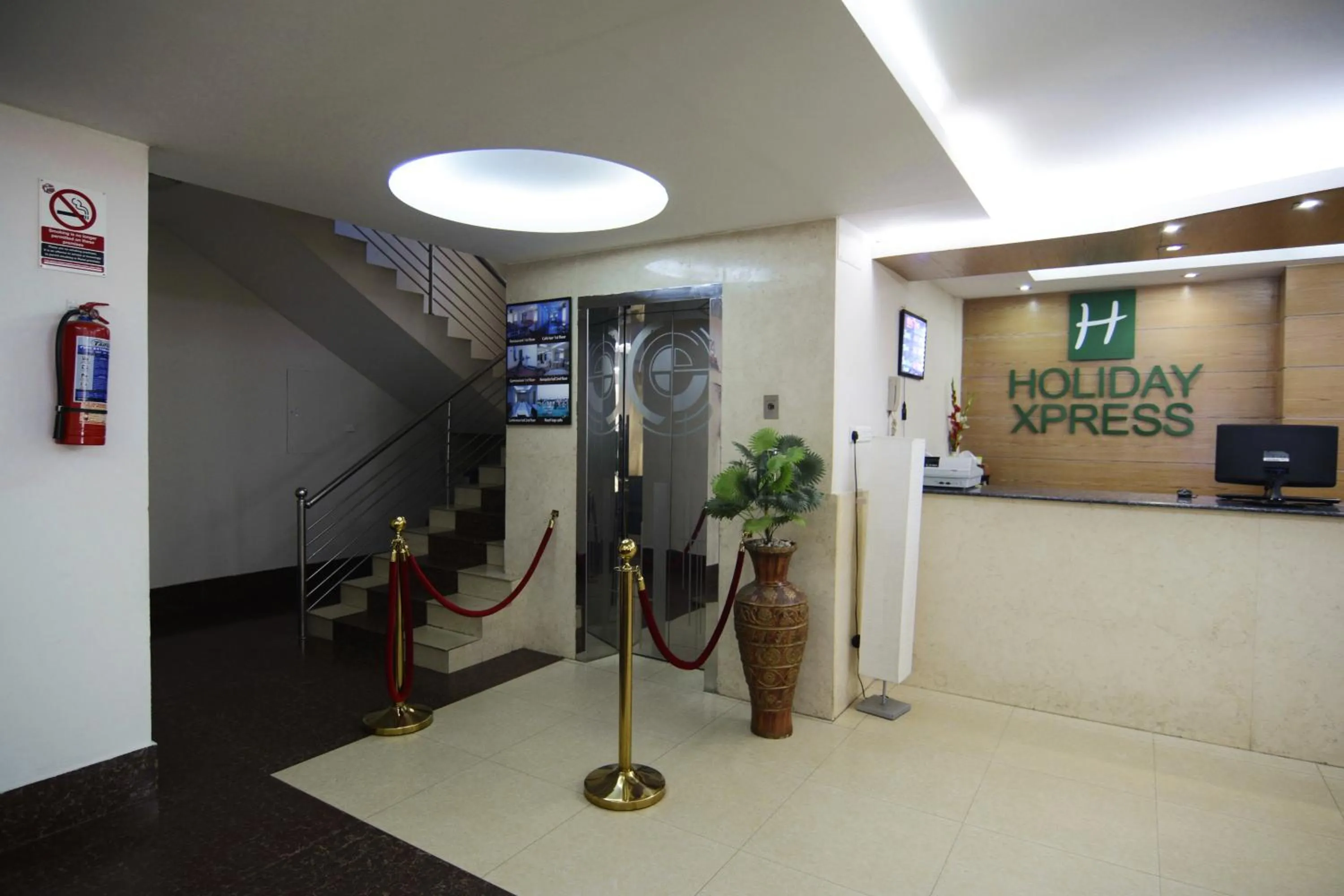 Property logo or sign in Holiday Xpress