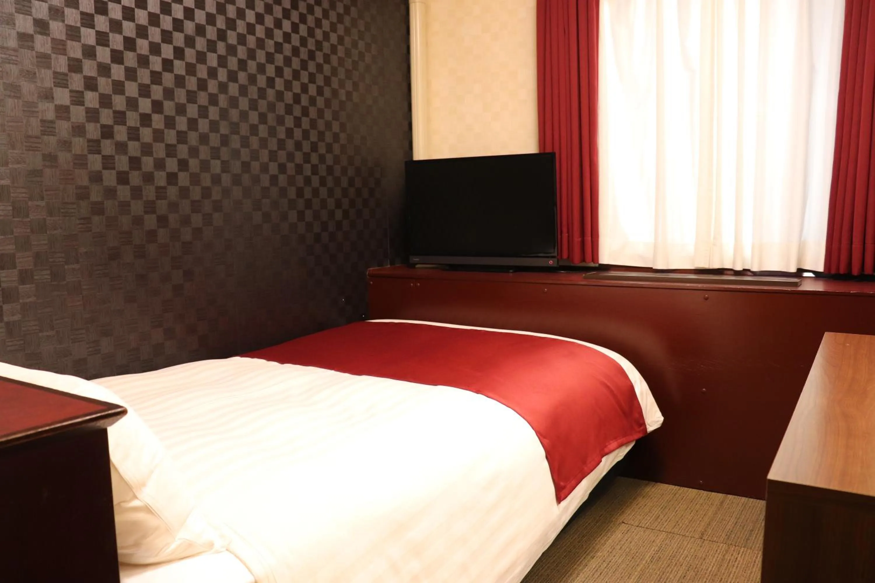 Bed in Pioland Hotel