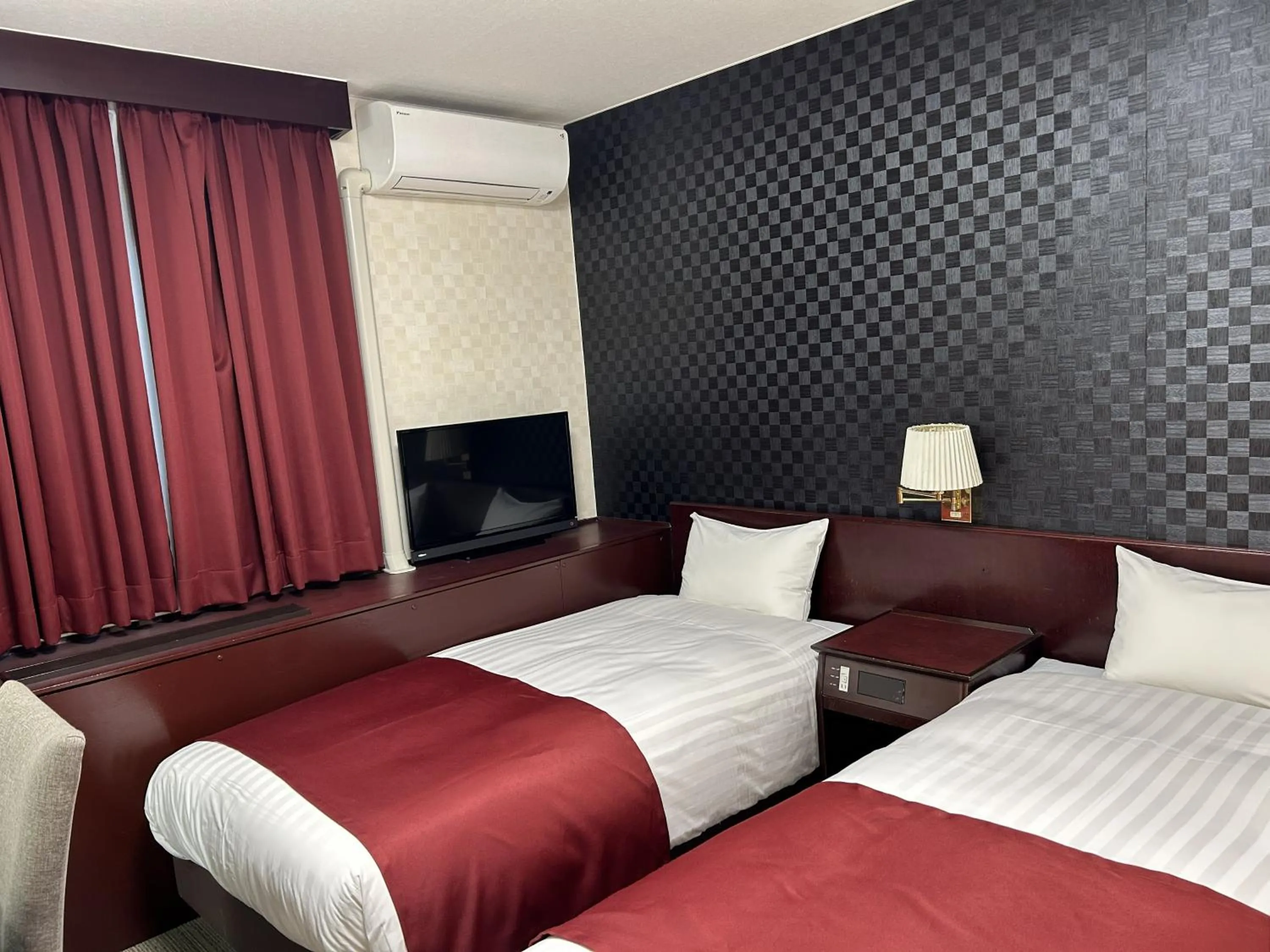 Bed in Pioland Hotel