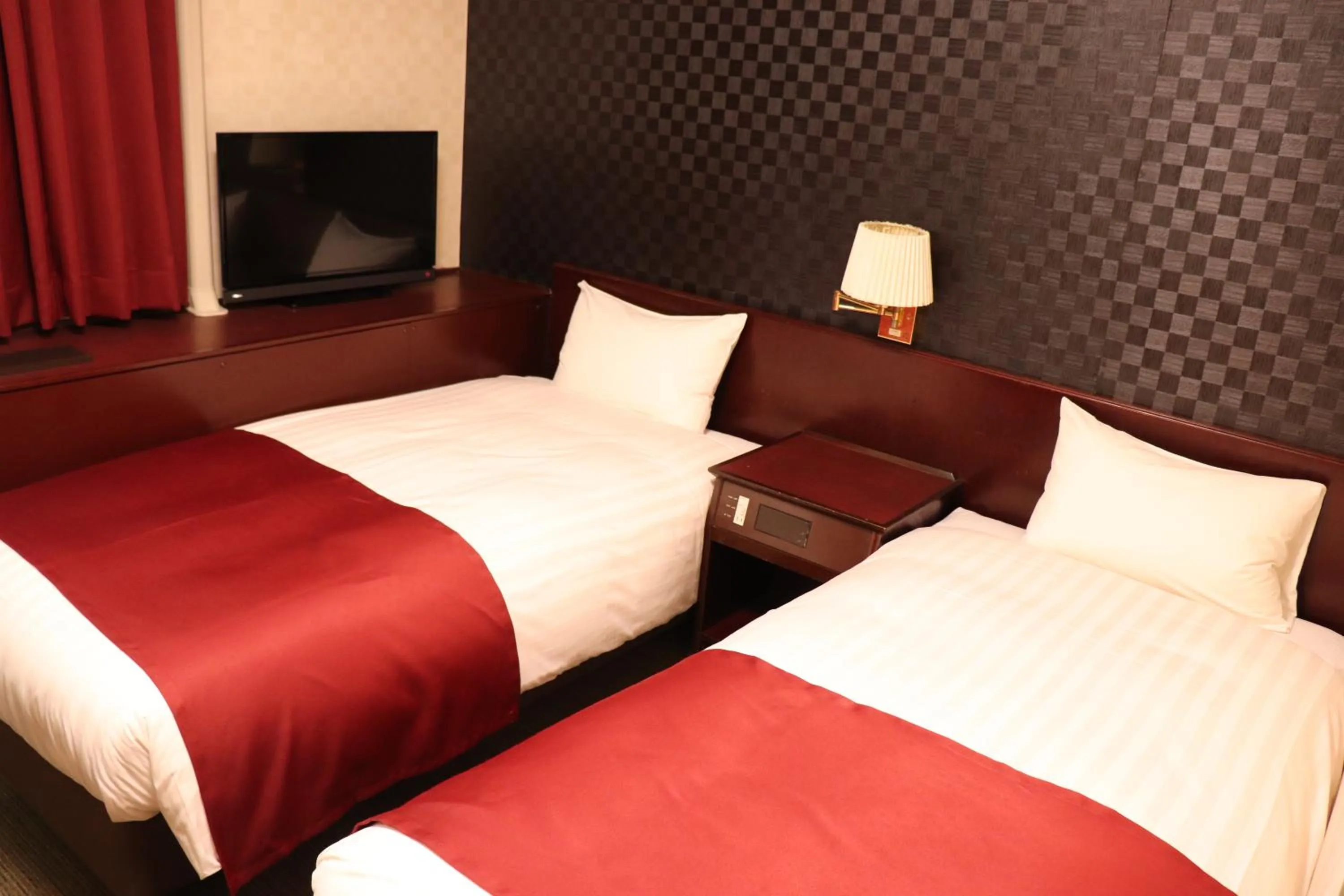 Bed in Pioland Hotel