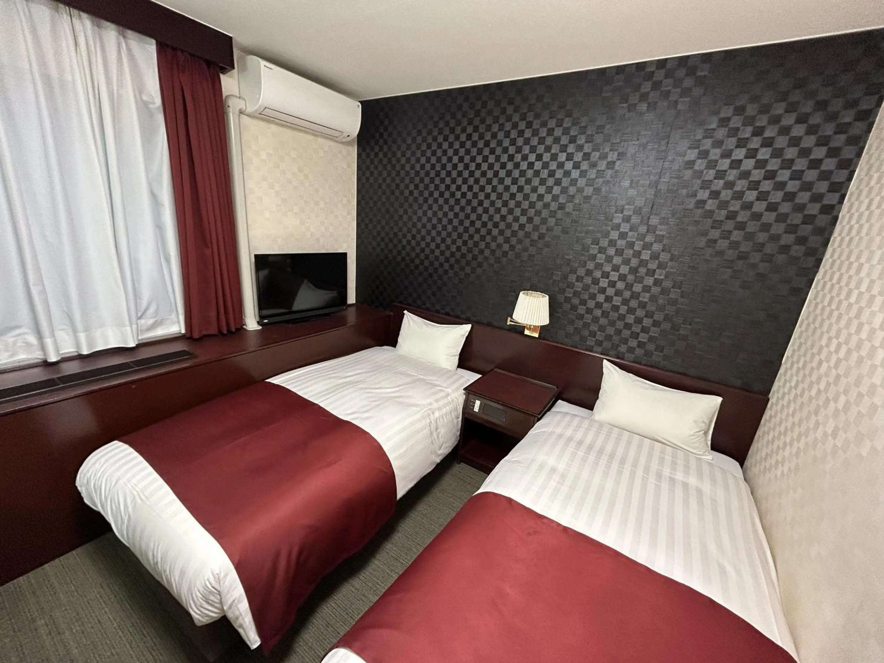 Bed in Pioland Hotel