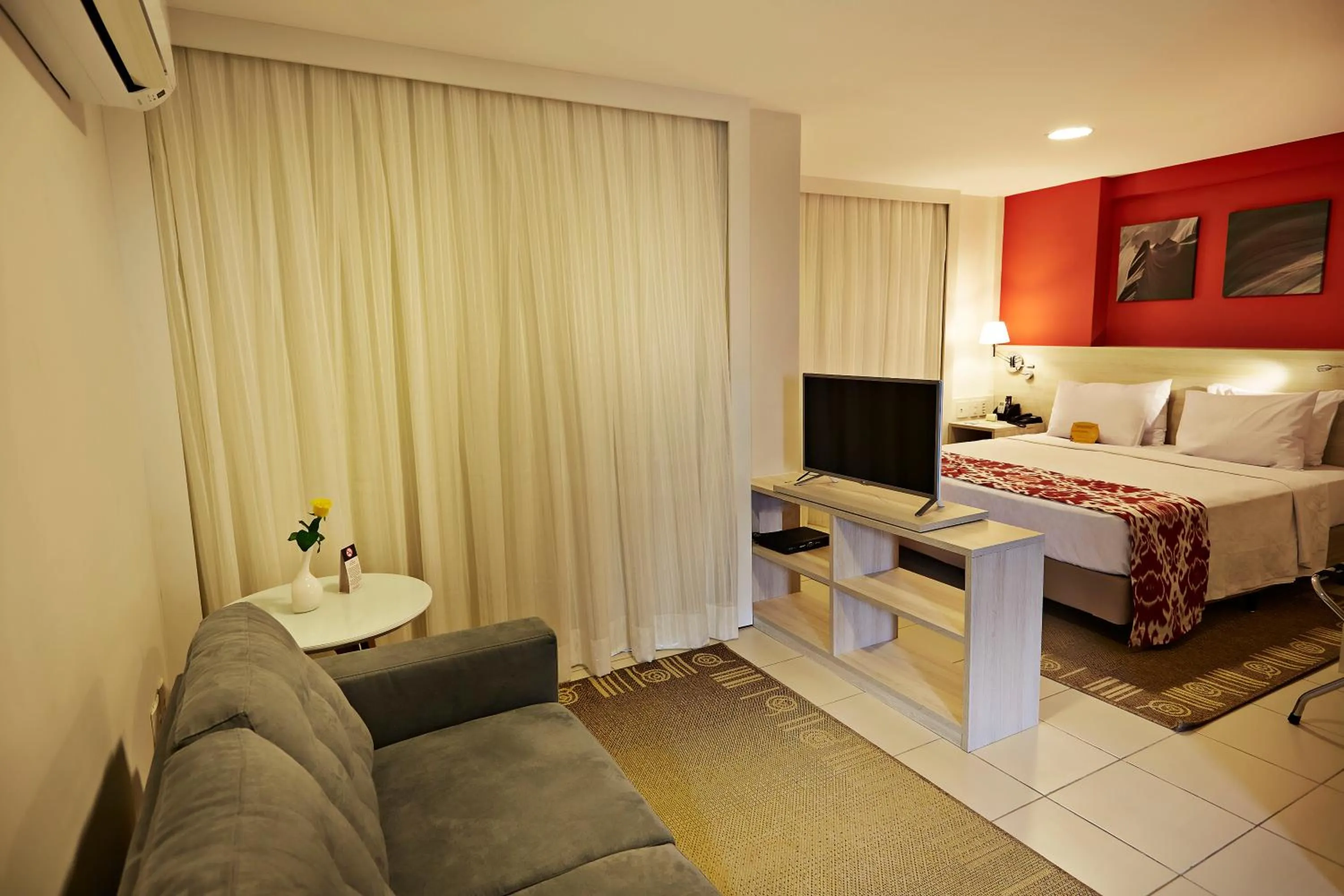 Living room, Bed in Comfort Hotel & Suites Natal