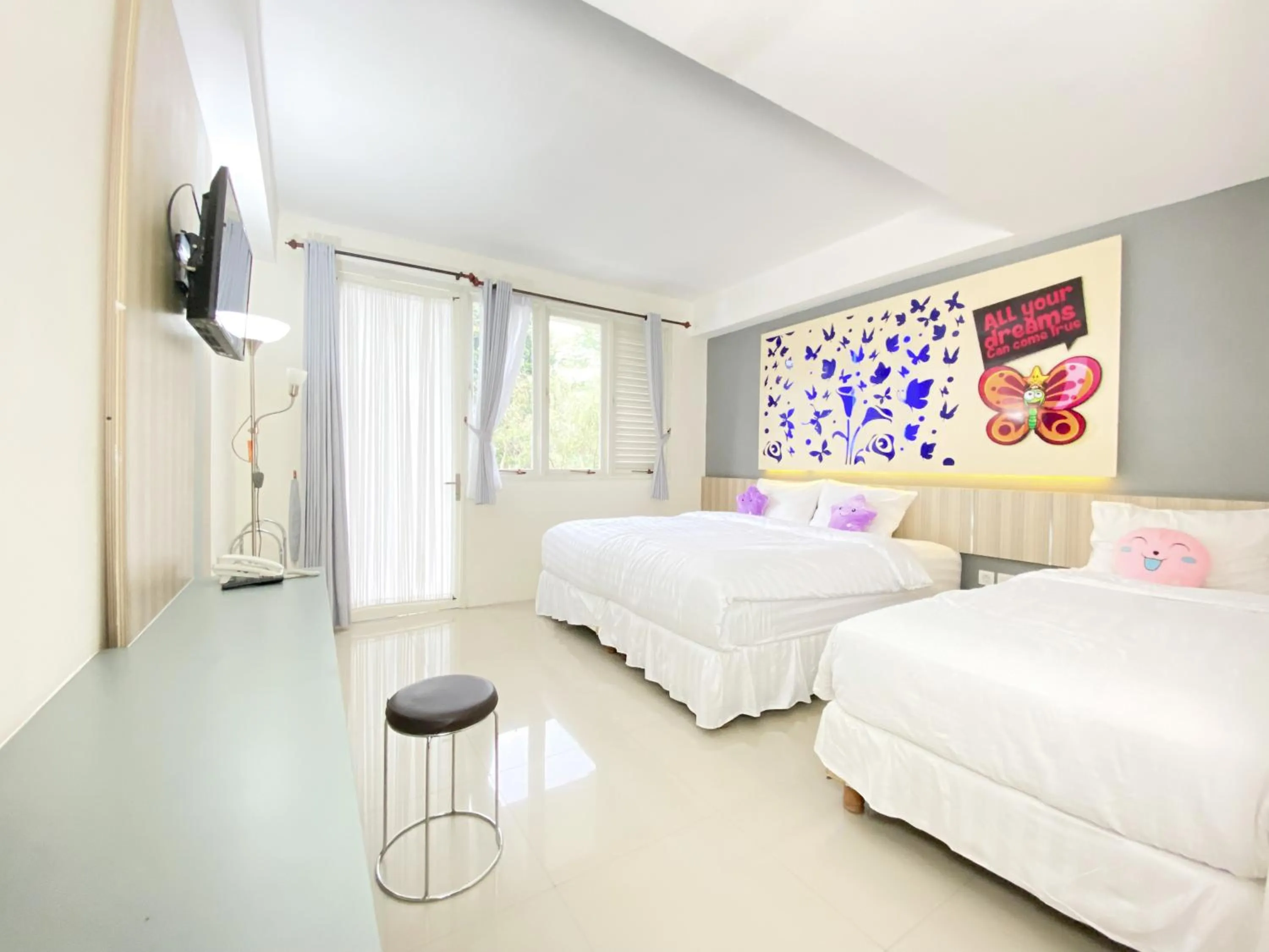 Bed in Transformer Center Hotel