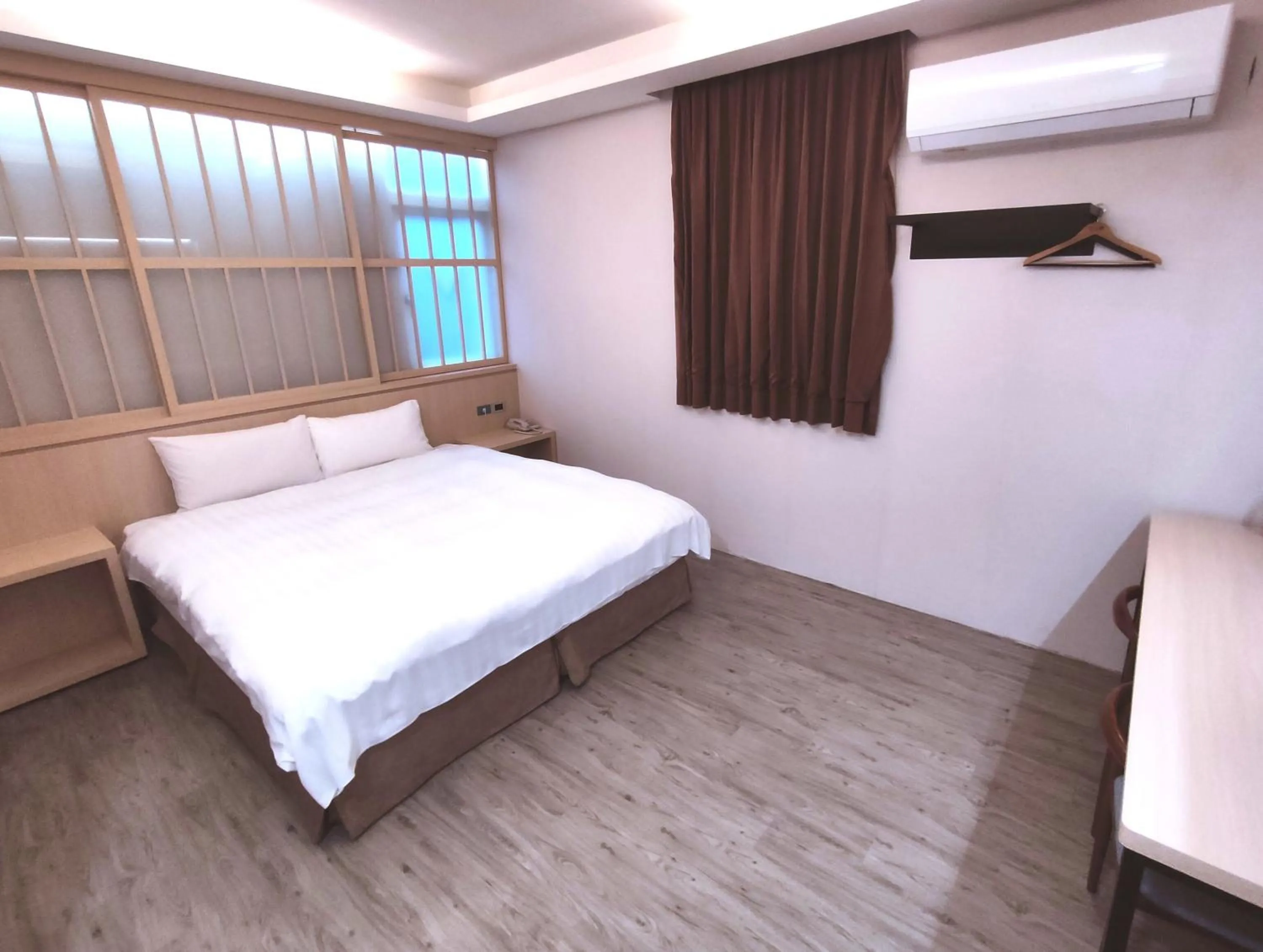 Bed in AOIKE Hot Spring Hotel