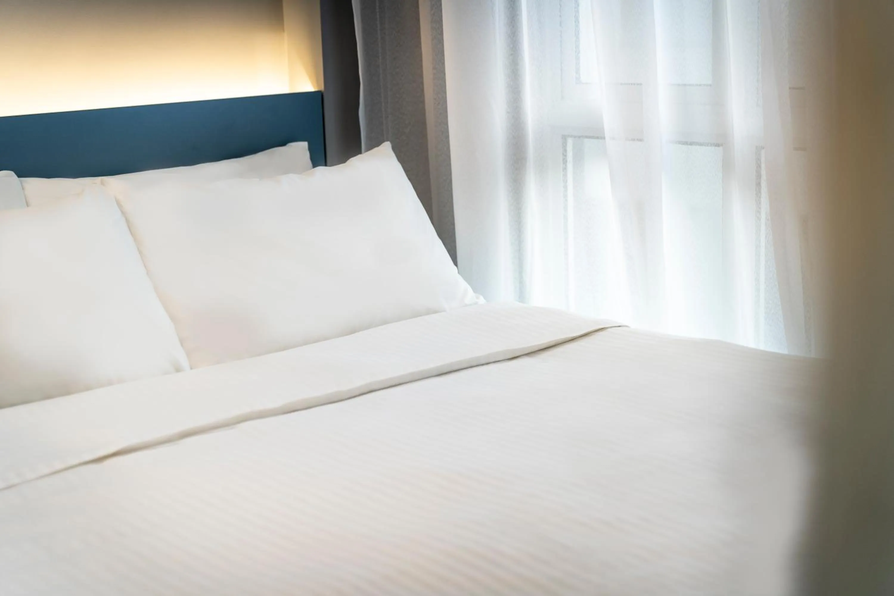 Bed in Hotel Bencoolen at Hong Kong Street