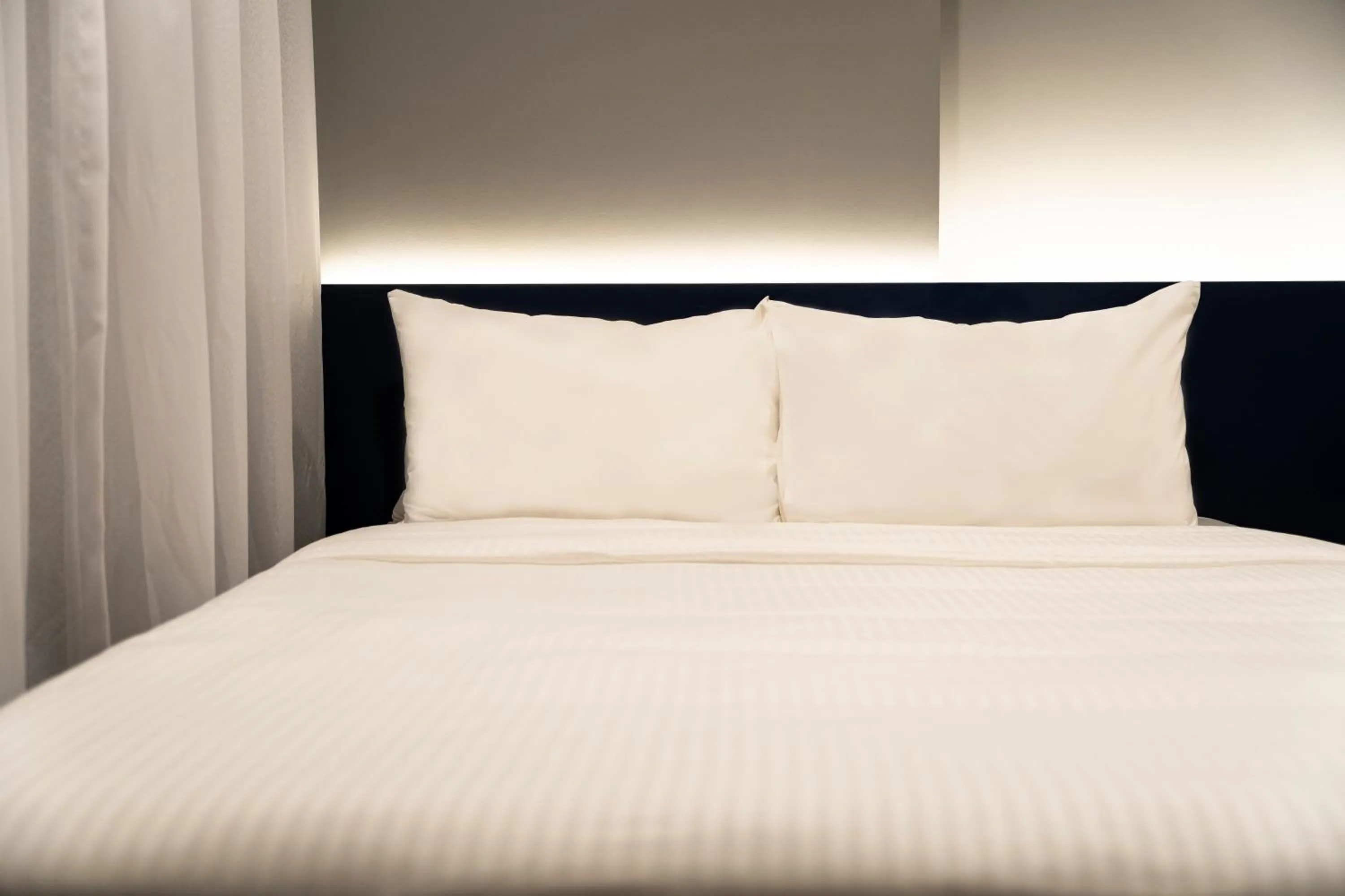 Bed in Hotel Bencoolen at Hong Kong Street