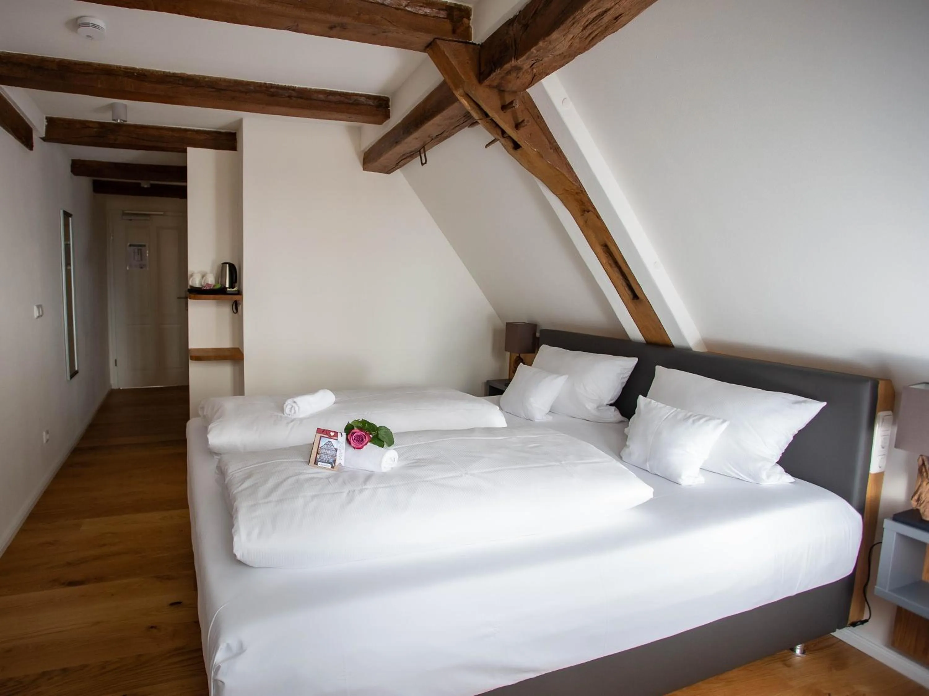 Photo of the whole room, Bed in Altstadthotel Treysa