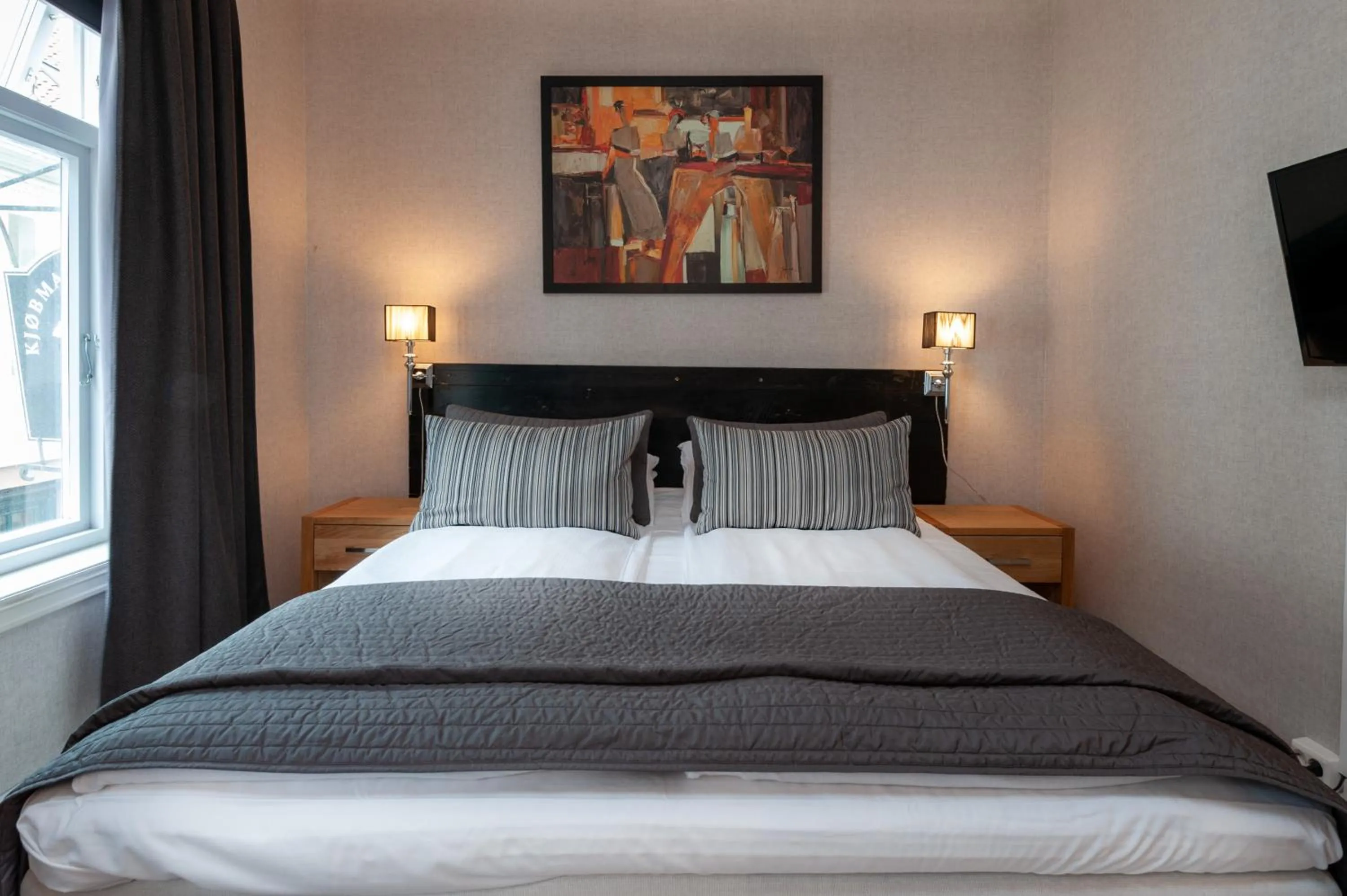 Bed in Kjøbmandsgaarden Hotel