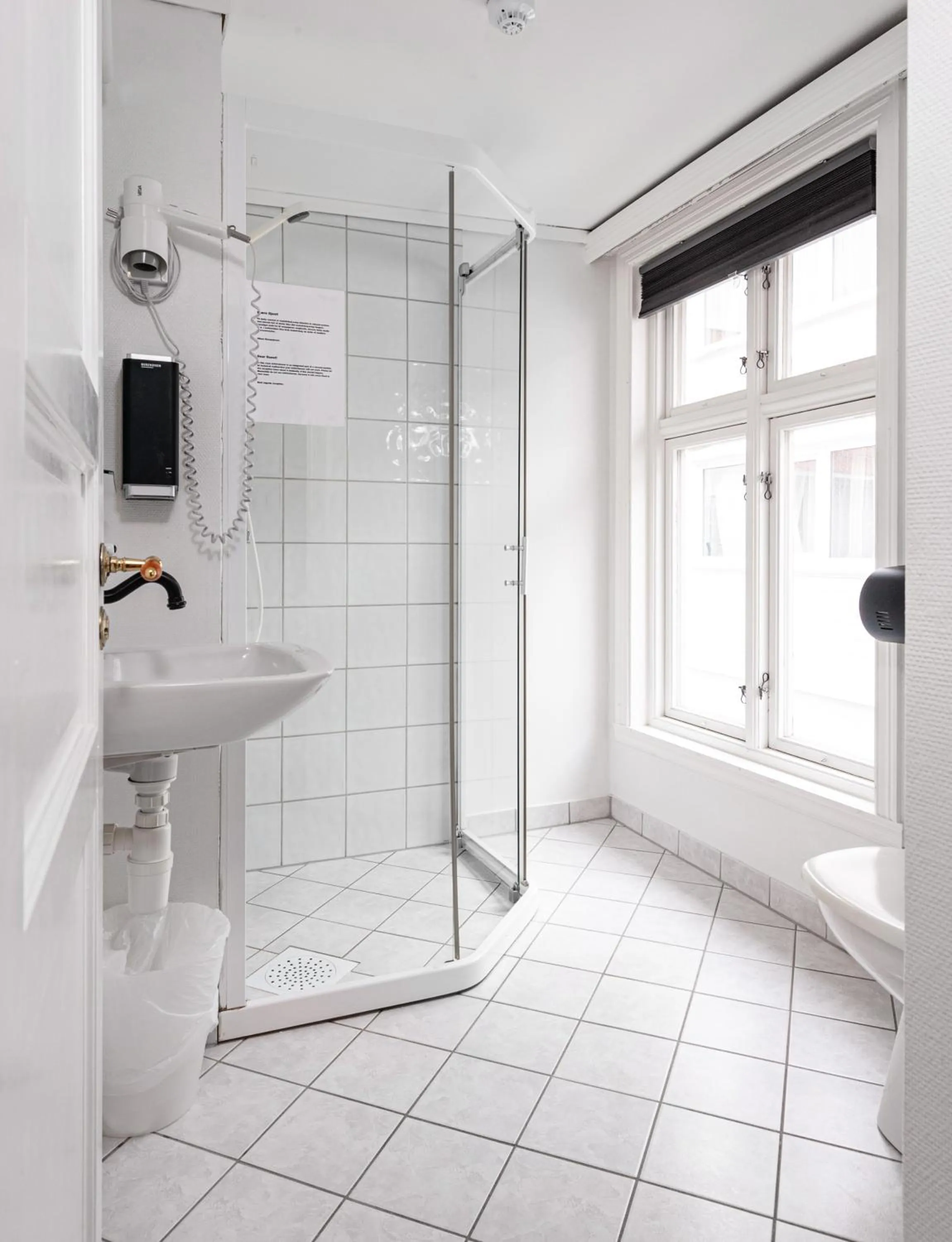 Bathroom in Kjøbmandsgaarden Hotel