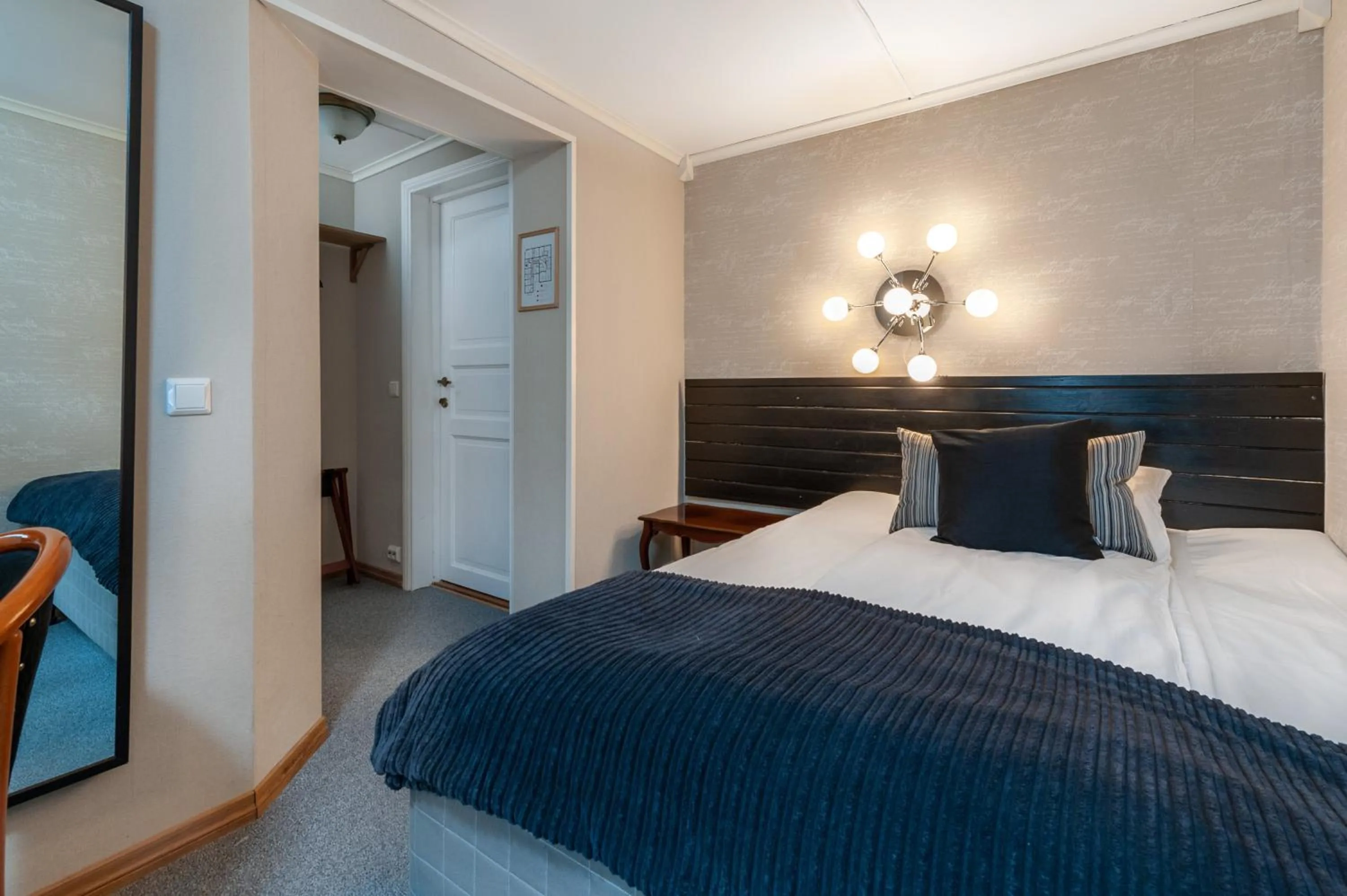 Bed in Kjøbmandsgaarden Hotel