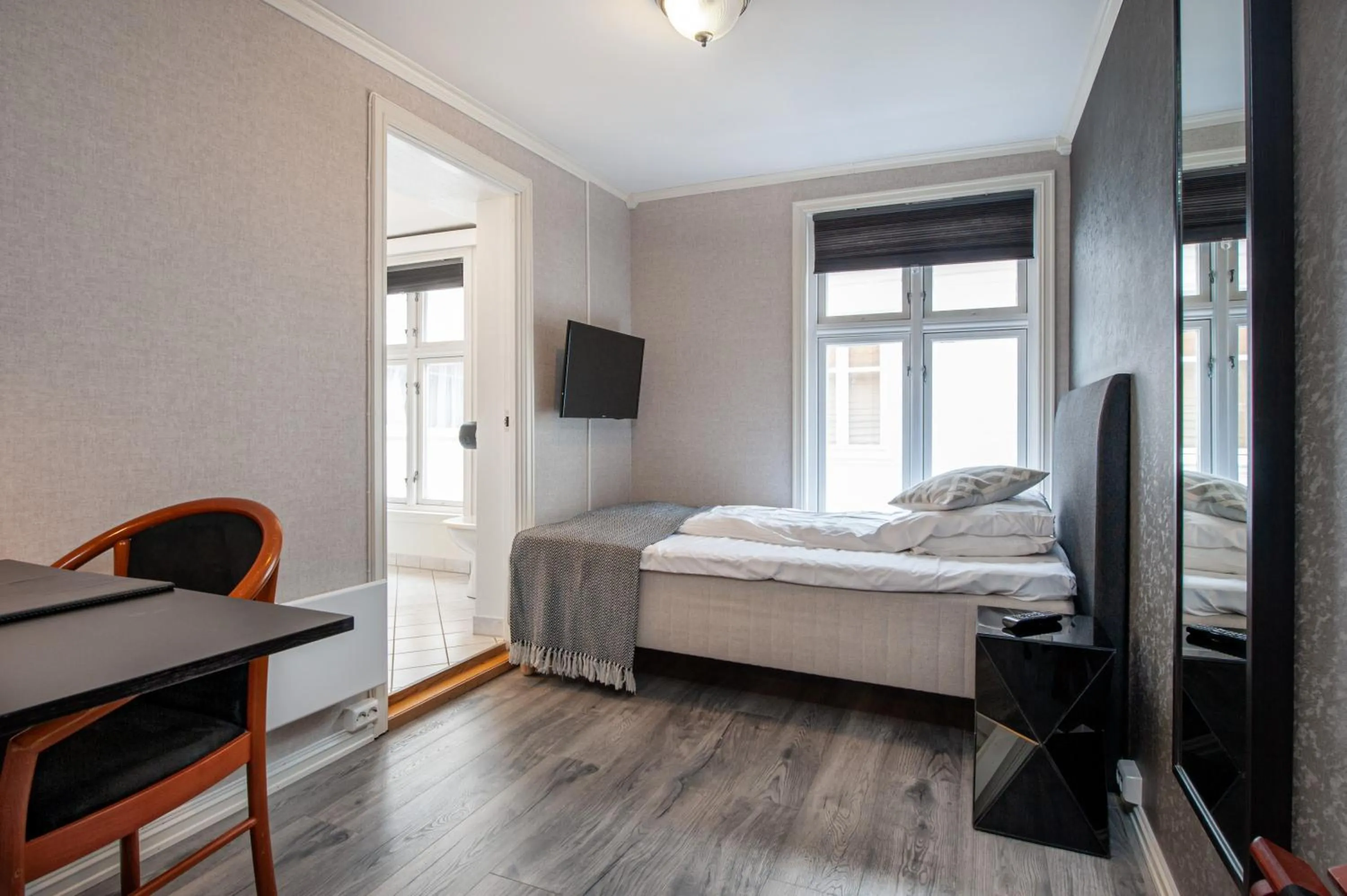 Bed in Kjøbmandsgaarden Hotel