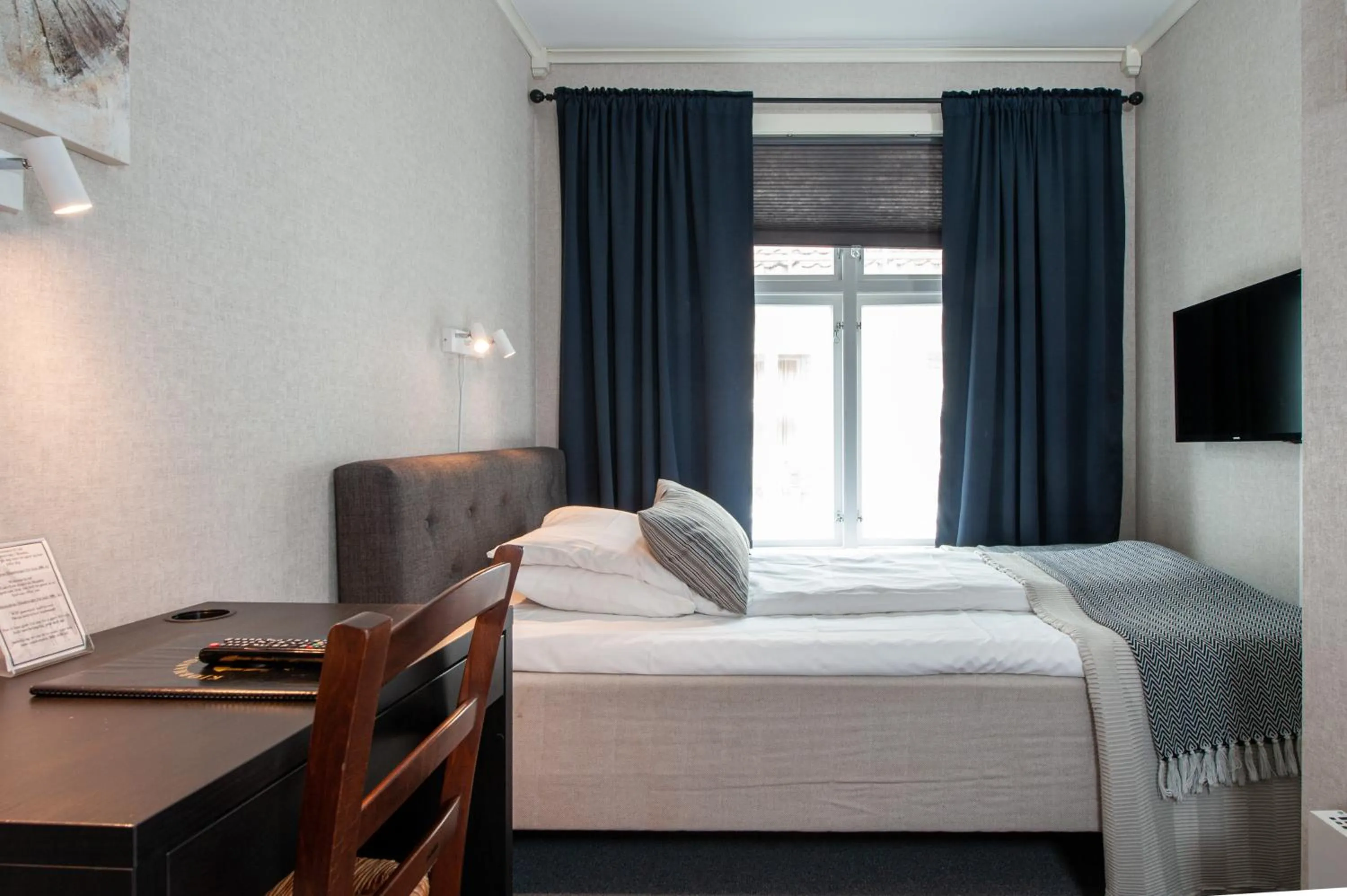 Bed in Kjøbmandsgaarden Hotel