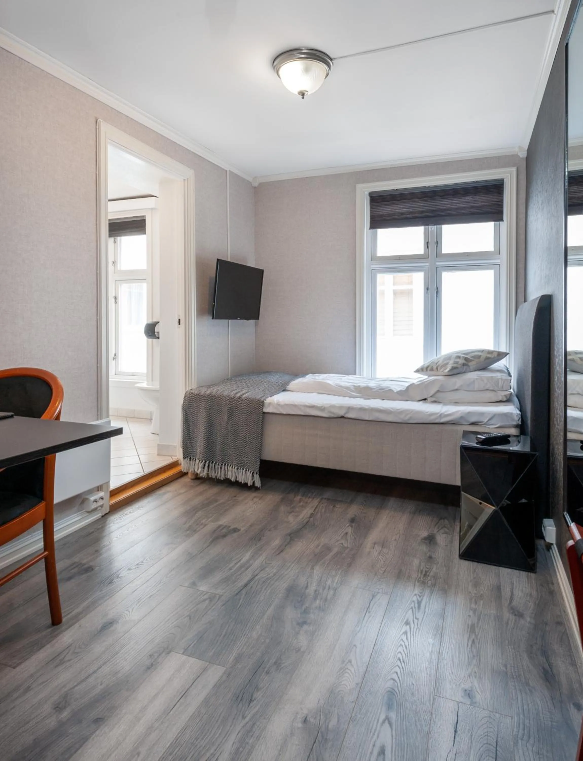 Bed in Kjøbmandsgaarden Hotel