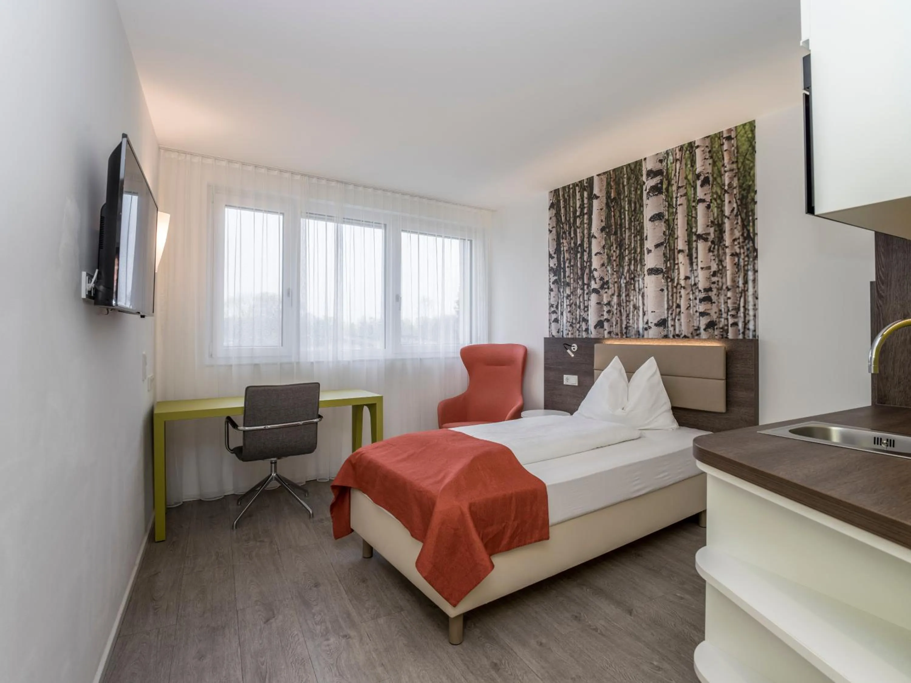 Bed in Eco Suite Hotel