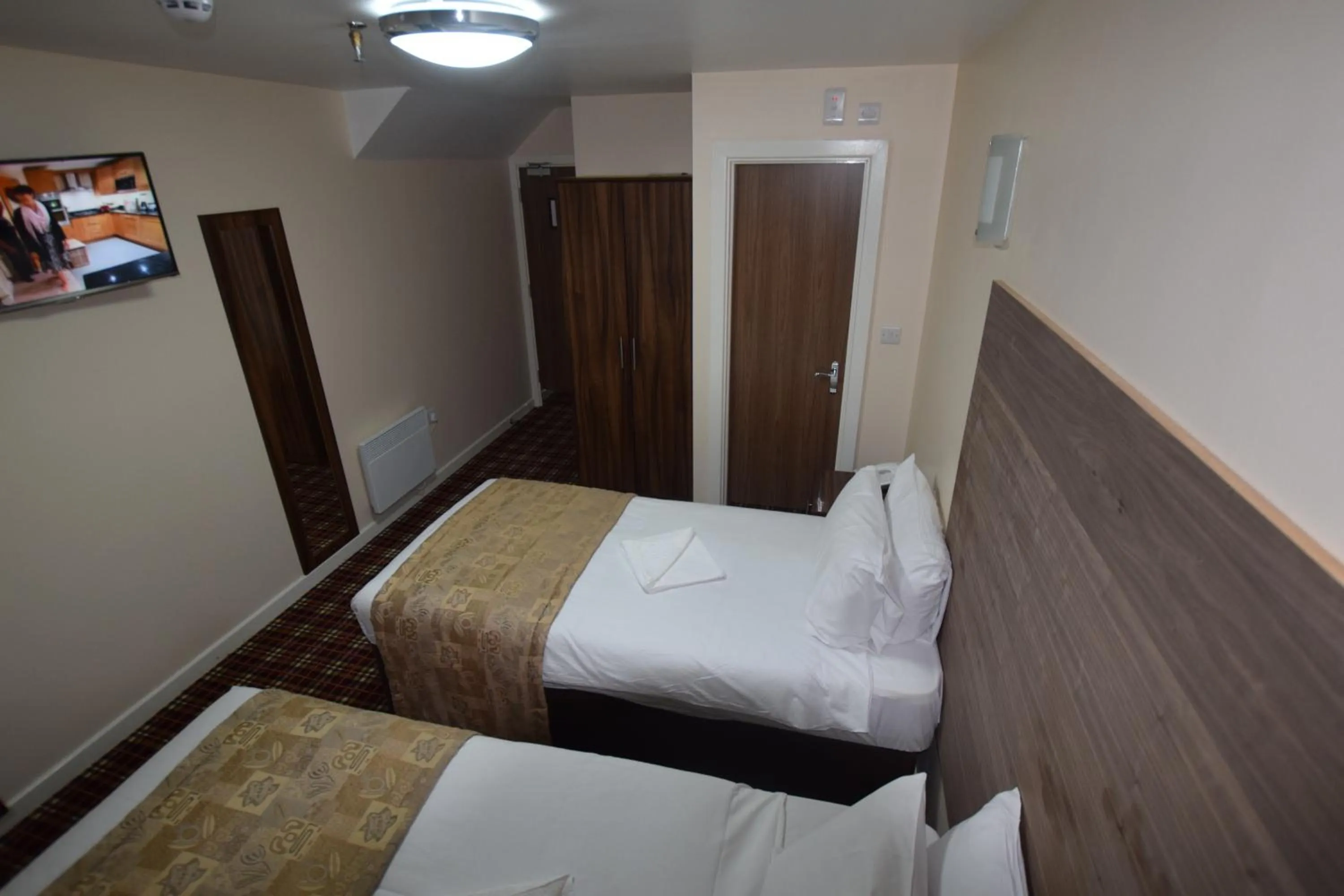 Photo of the whole room, Bed in Lucky 8 Hotel