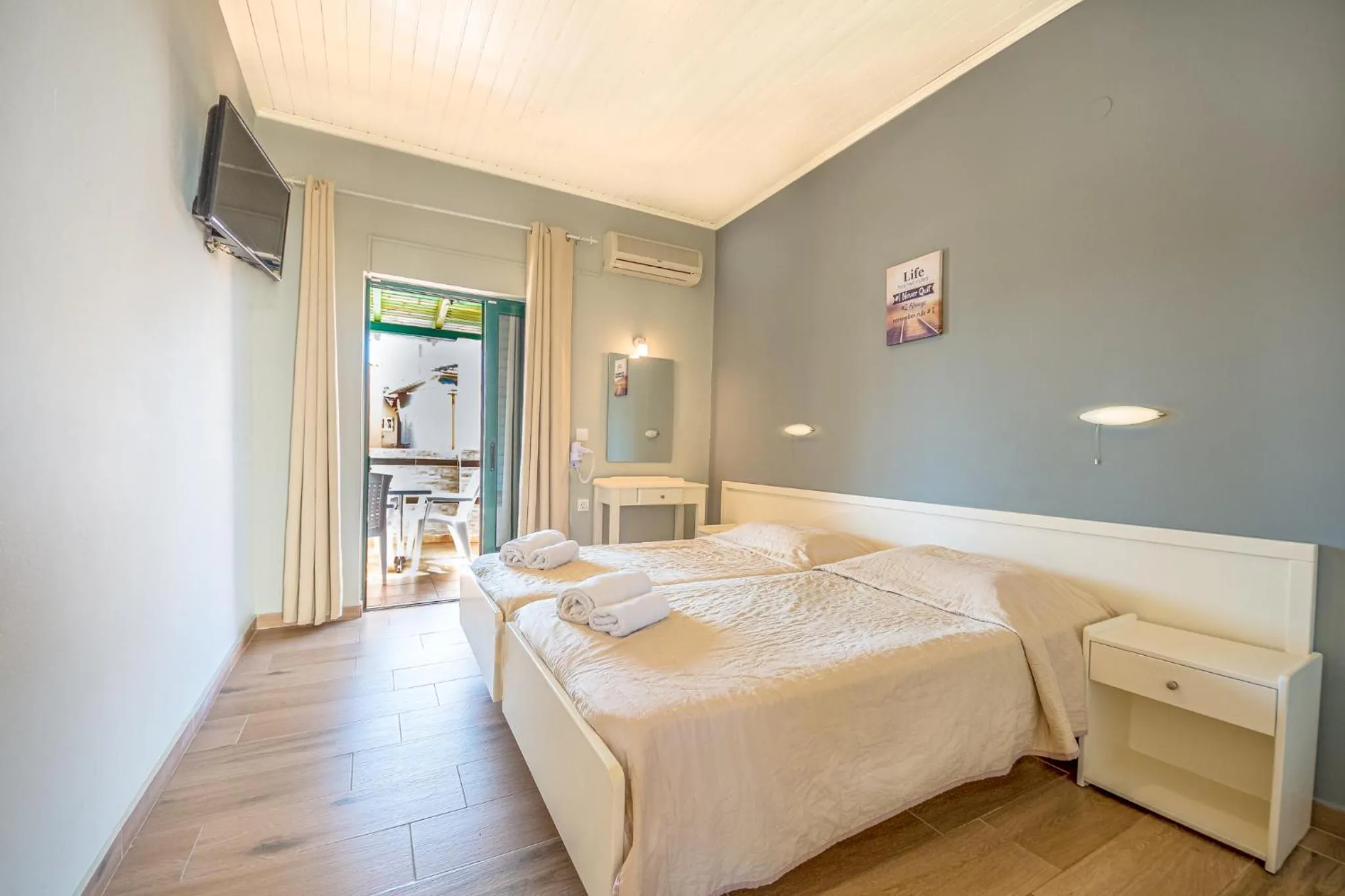 Bed in Chandris Apartments