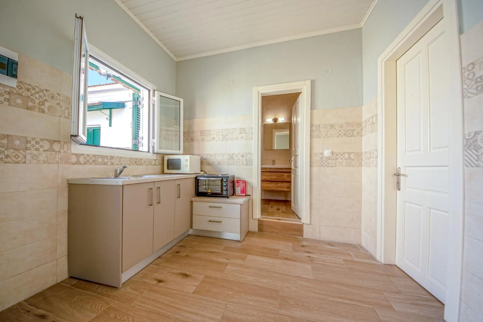 Kitchen or kitchenette in Chandris Apartments