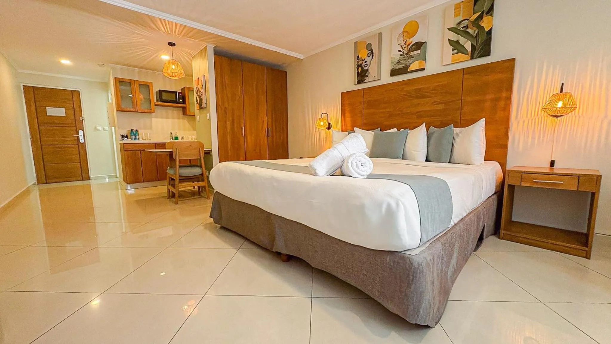Bed in Majestic City Suites & Beach Hotel