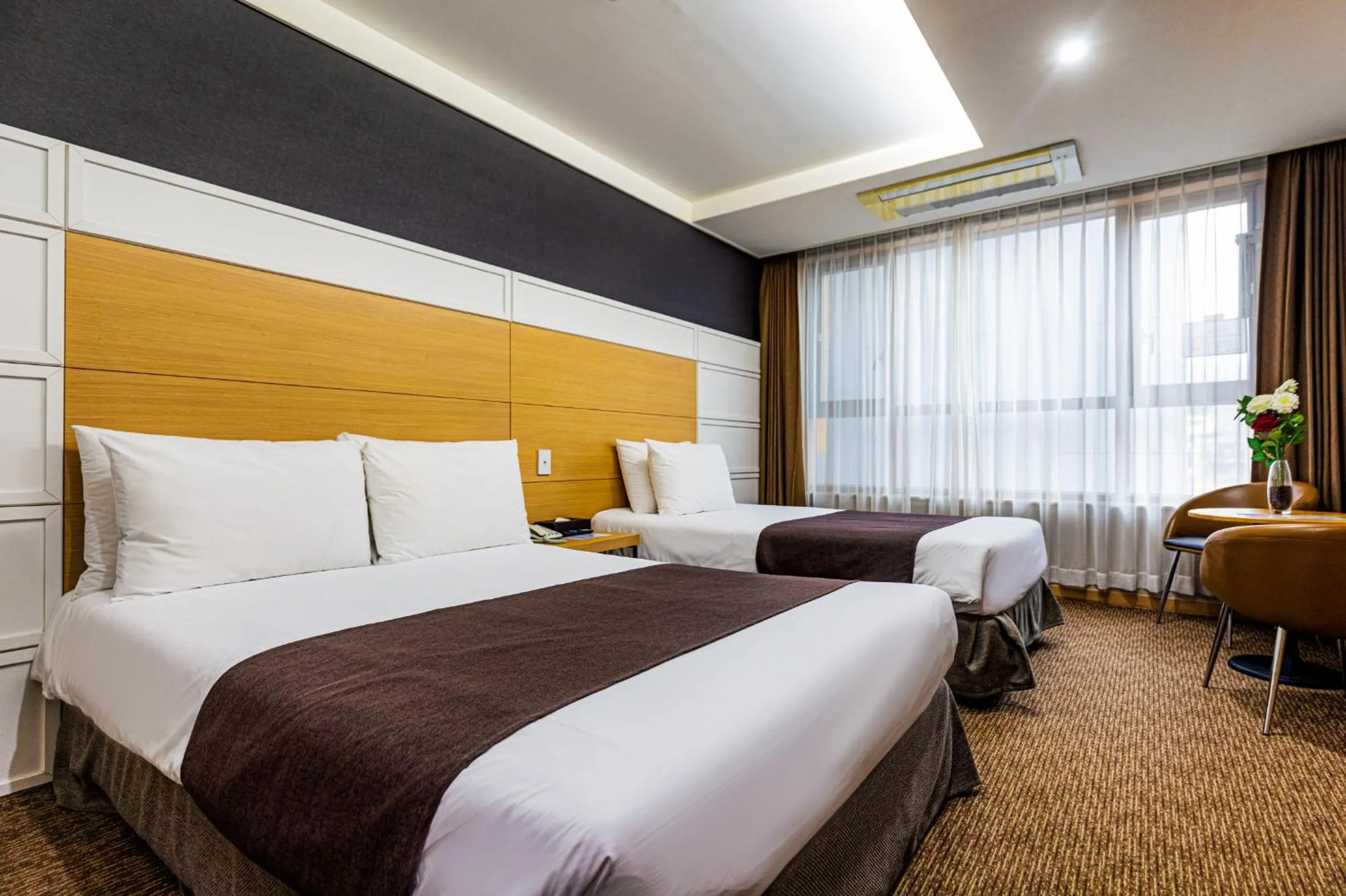 Bed in Eastern Hotel Jeju