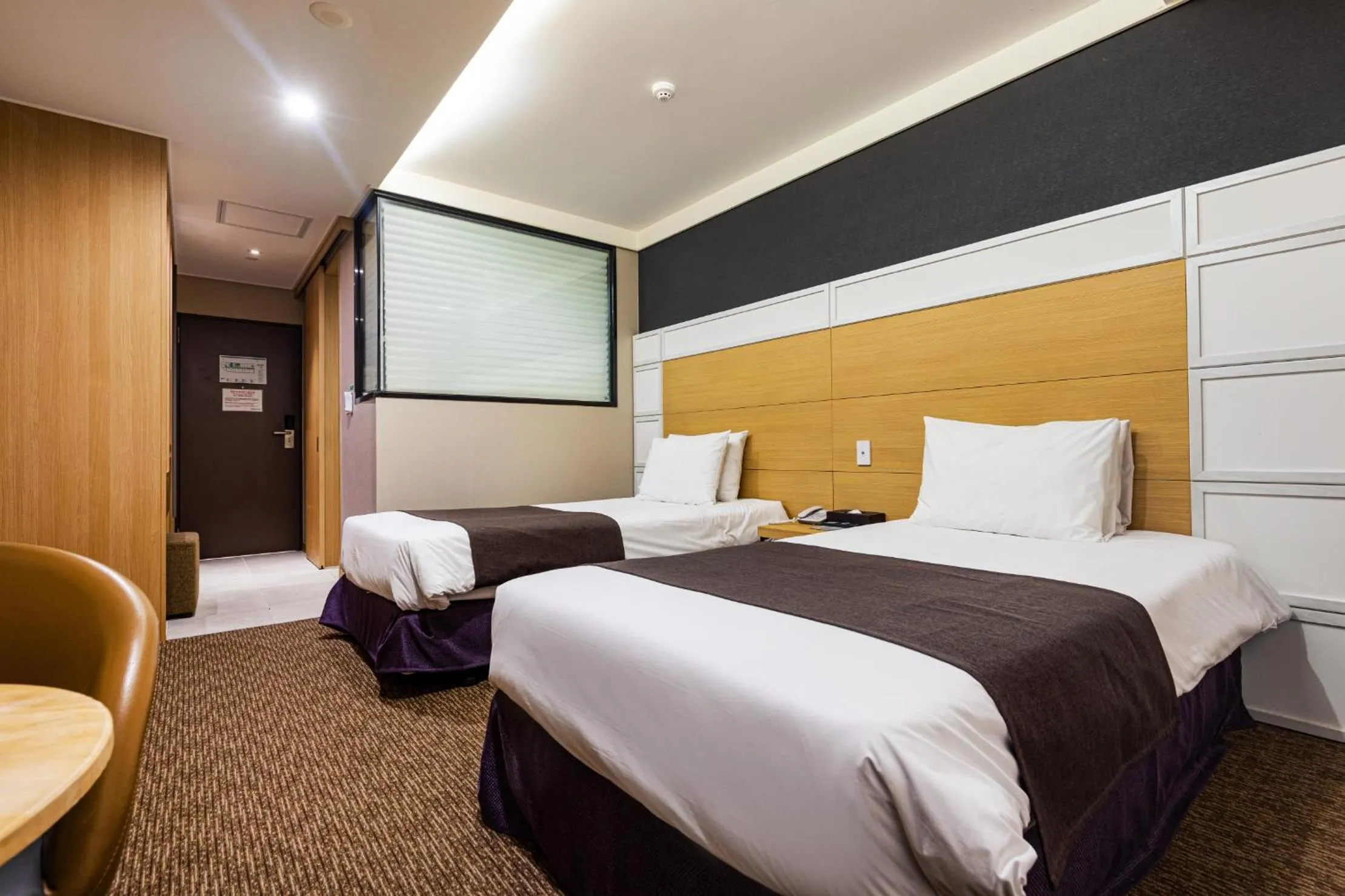 Bed in Eastern Hotel Jeju