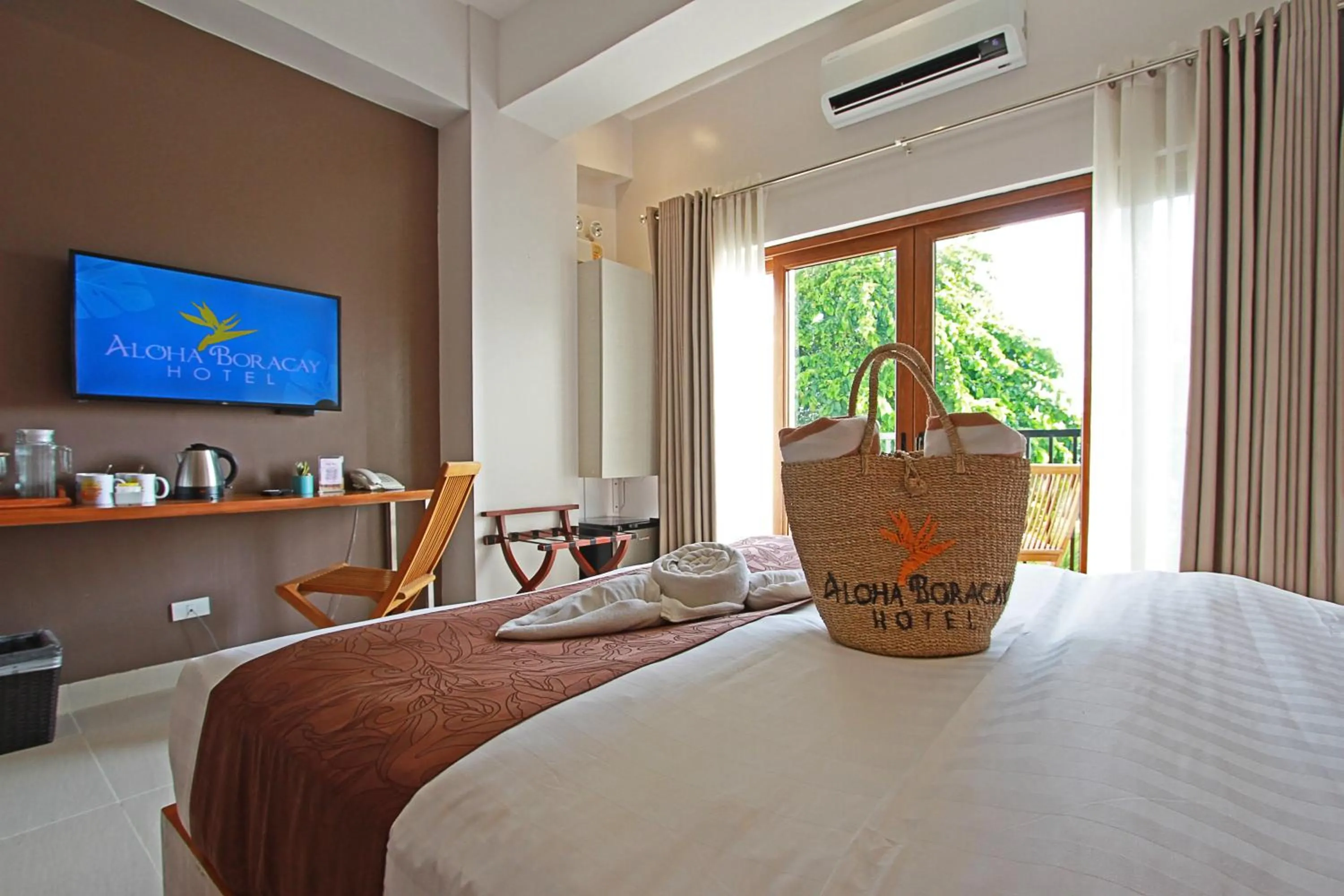 Bed in Aloha Boracay Hotel