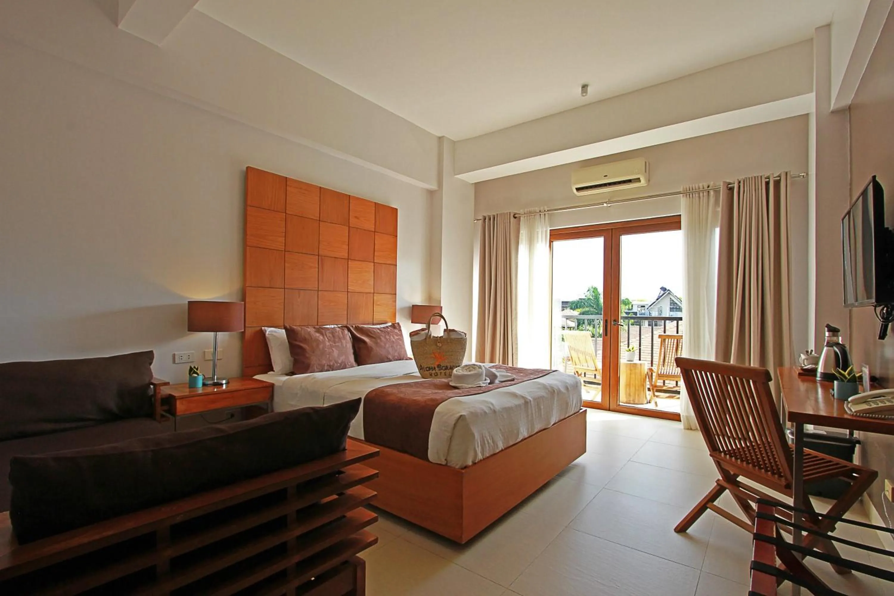 Bed in Aloha Boracay Hotel