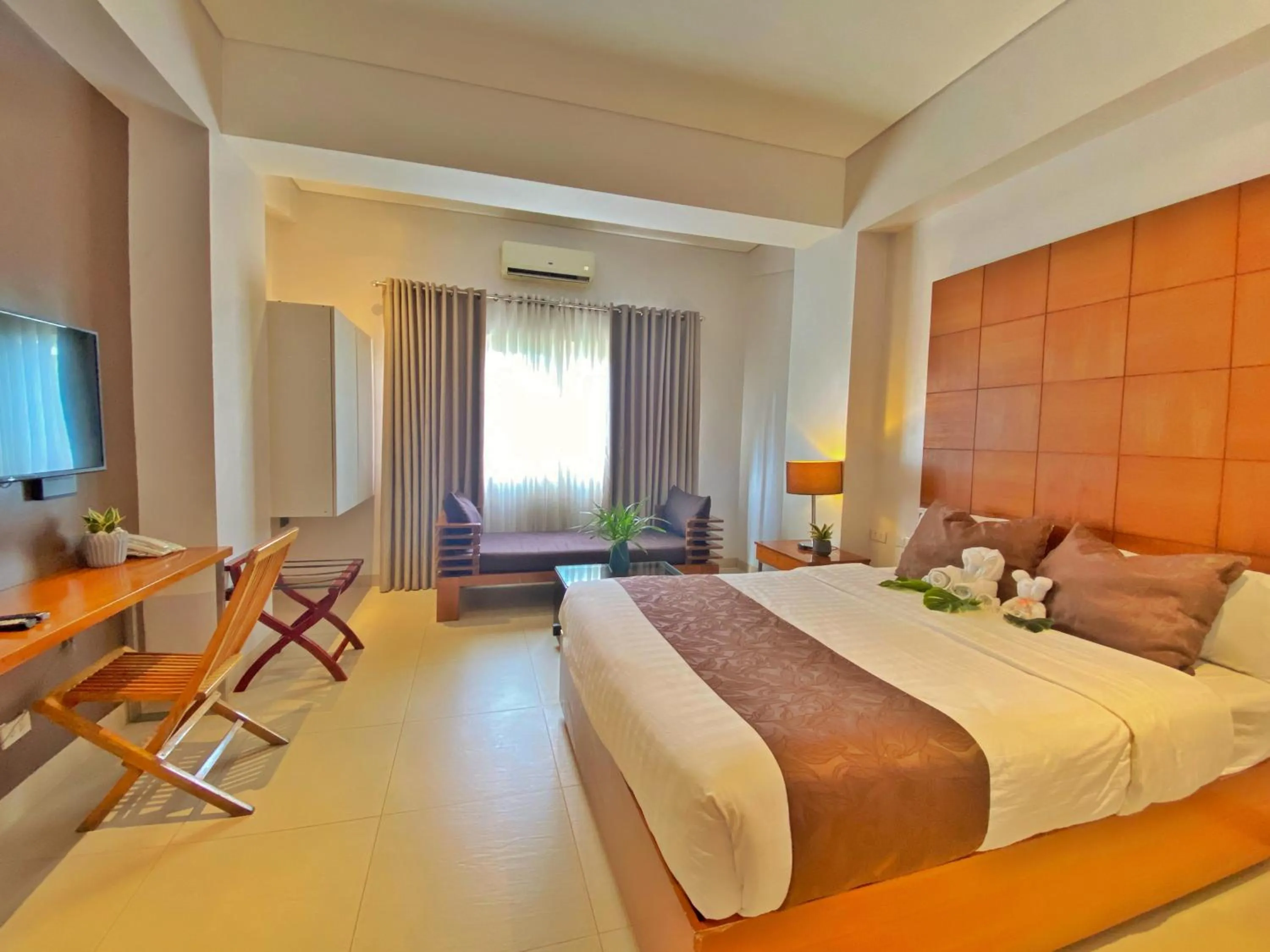 Bed in Aloha Boracay Hotel