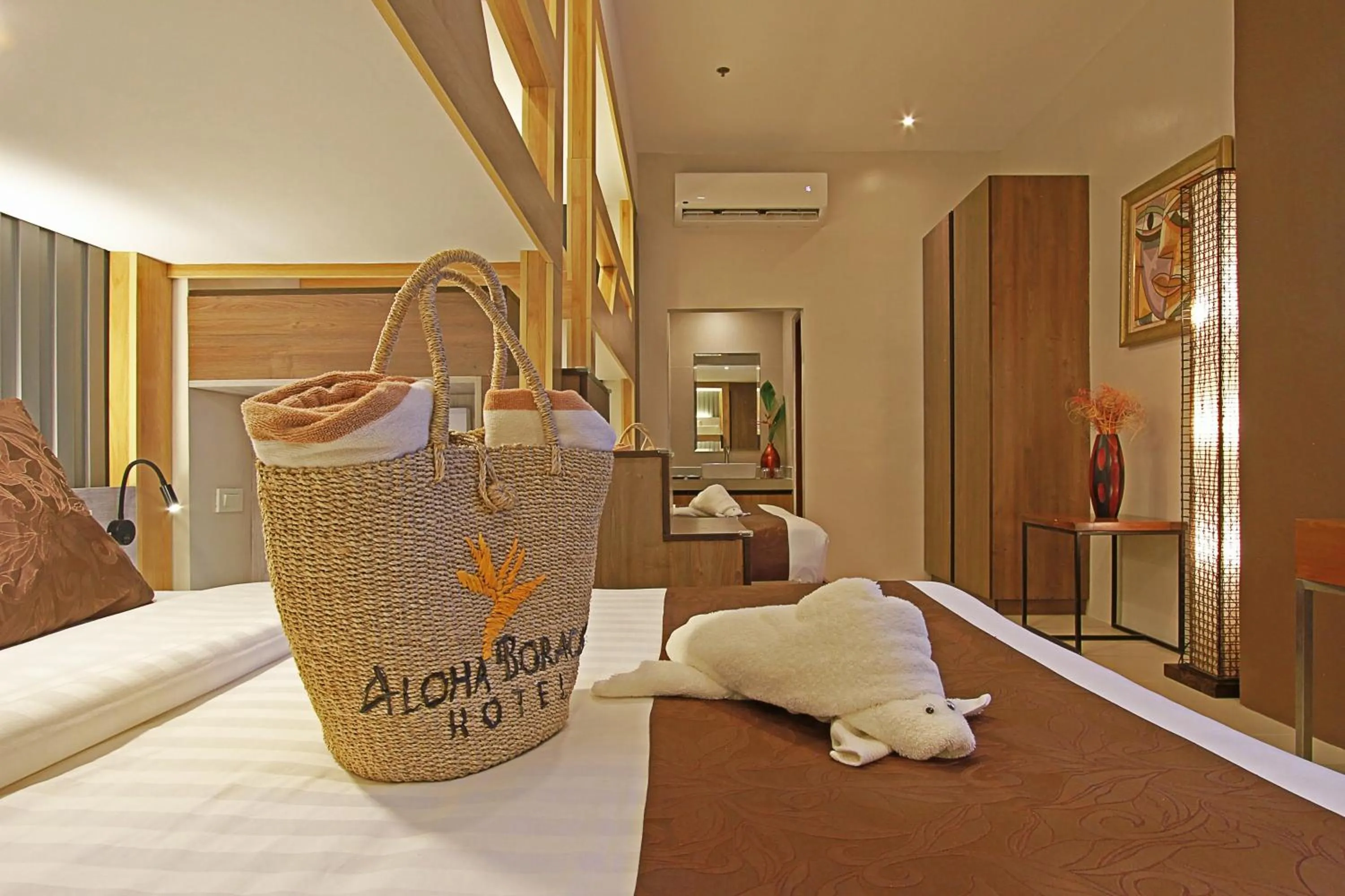 Bed in Aloha Boracay Hotel