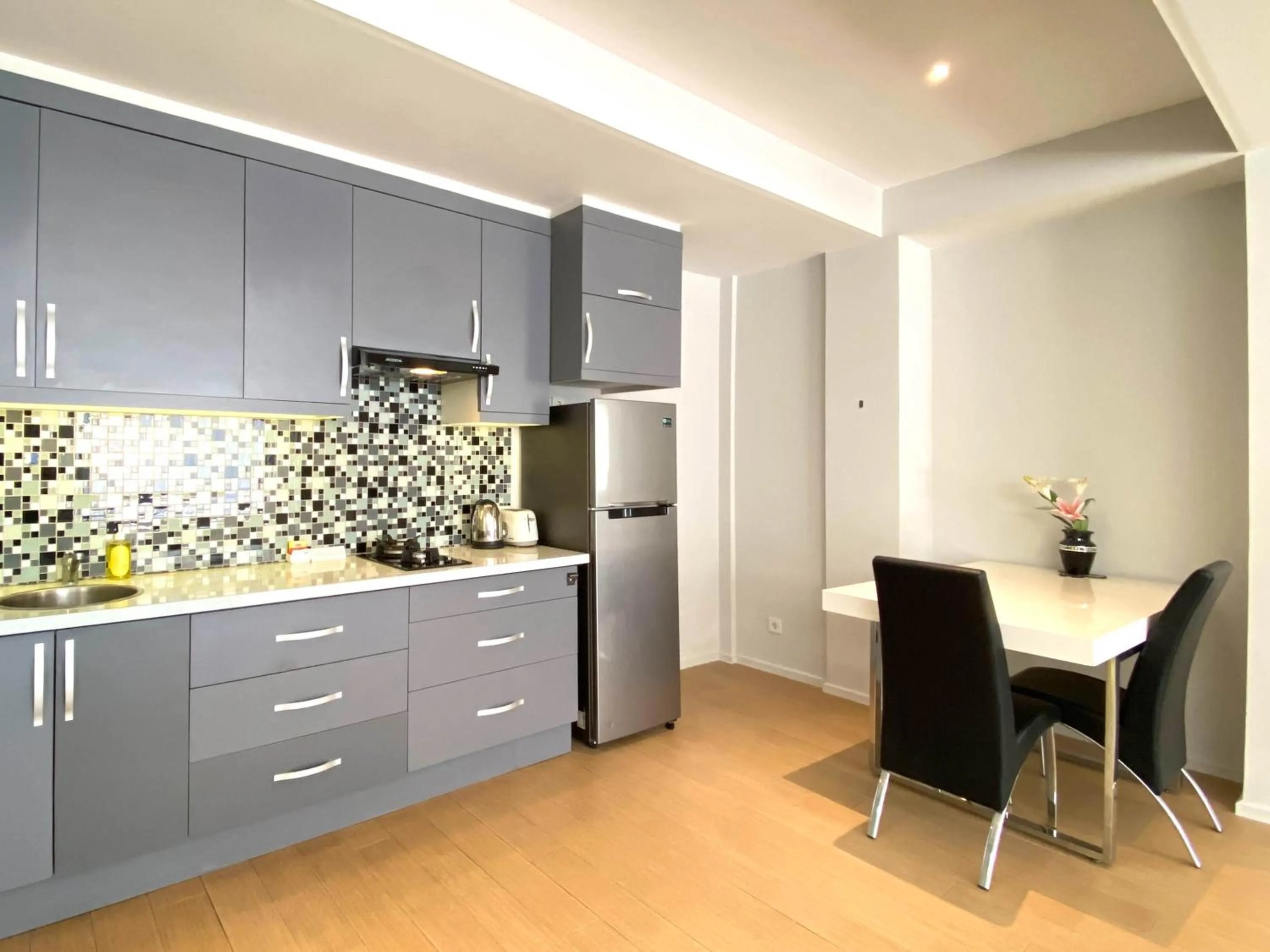 Kitchen or kitchenette in Coast Boutique Hotel