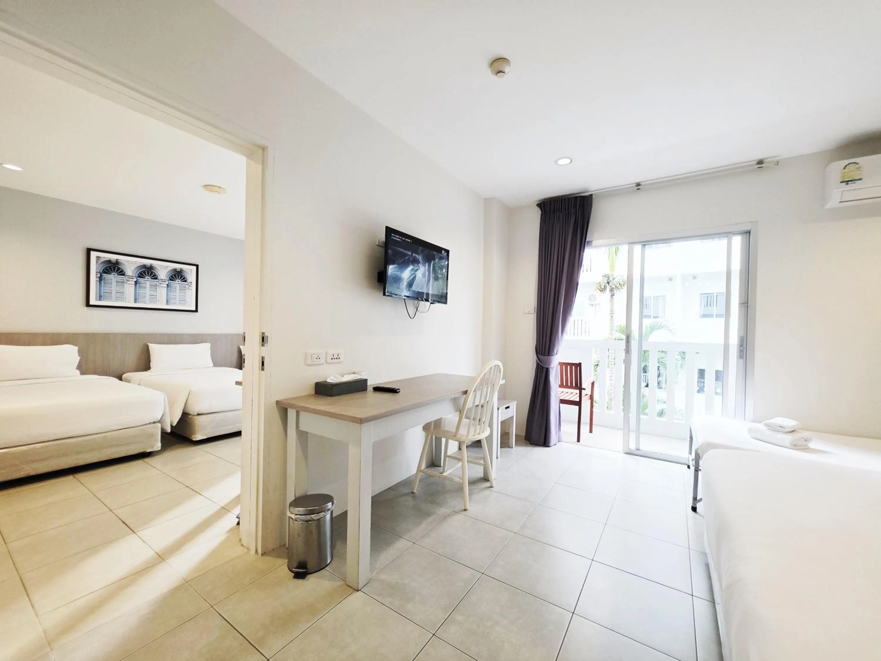 Bed in Recenta Phuket Suanluang by Deevana