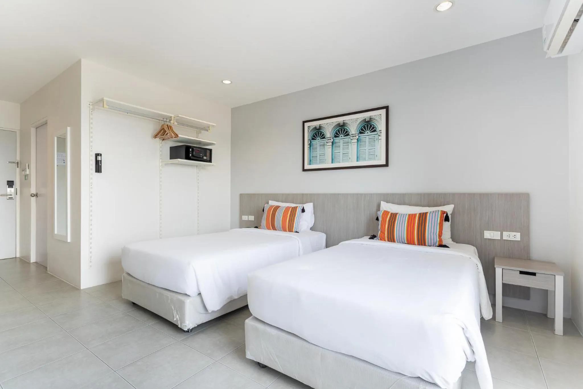 Bed in Recenta Phuket Suanluang by Deevana