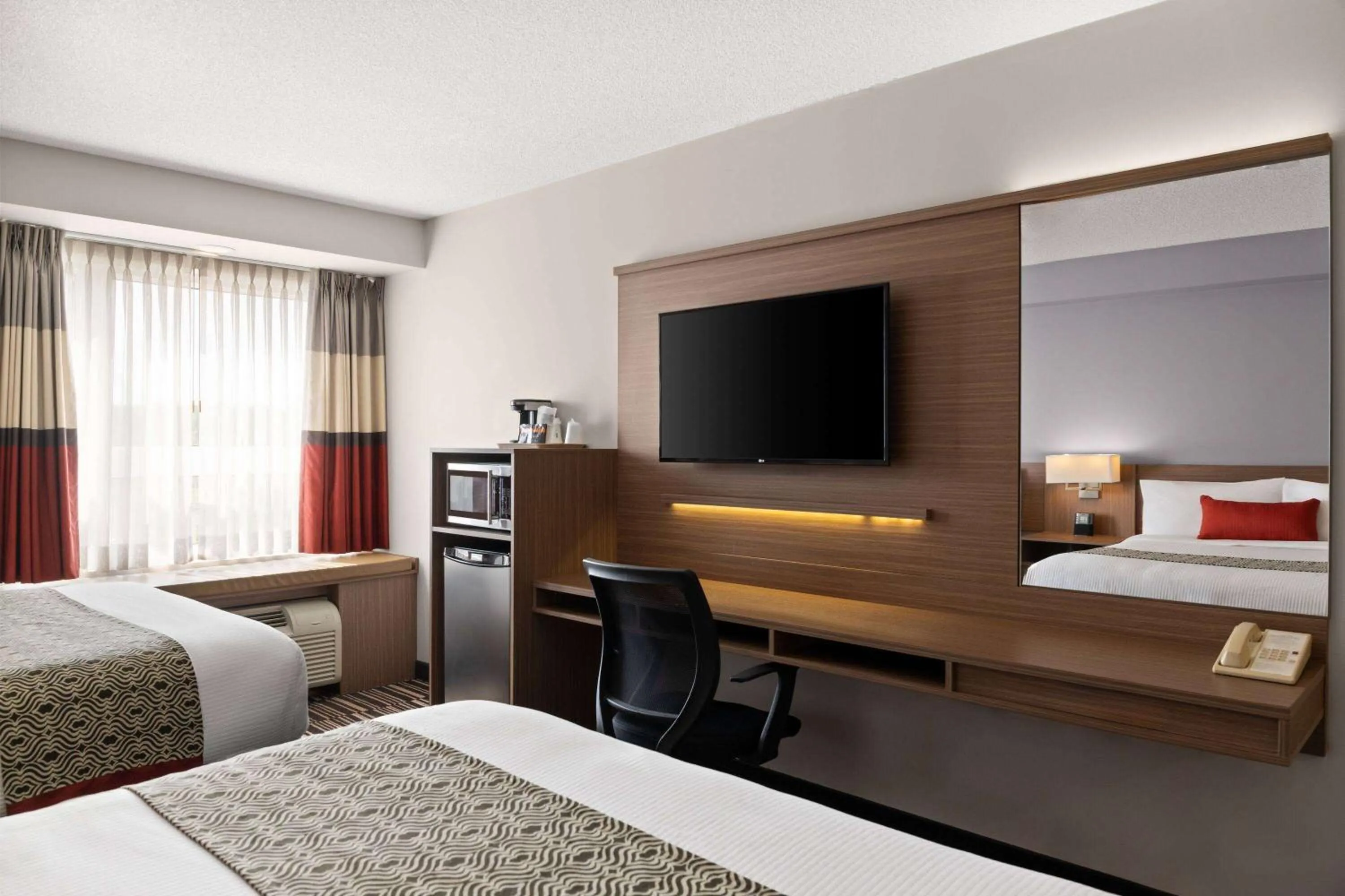 Photo of the whole room, Bed in Microtel Inn & Suites by Wyndham Kirkland Lake