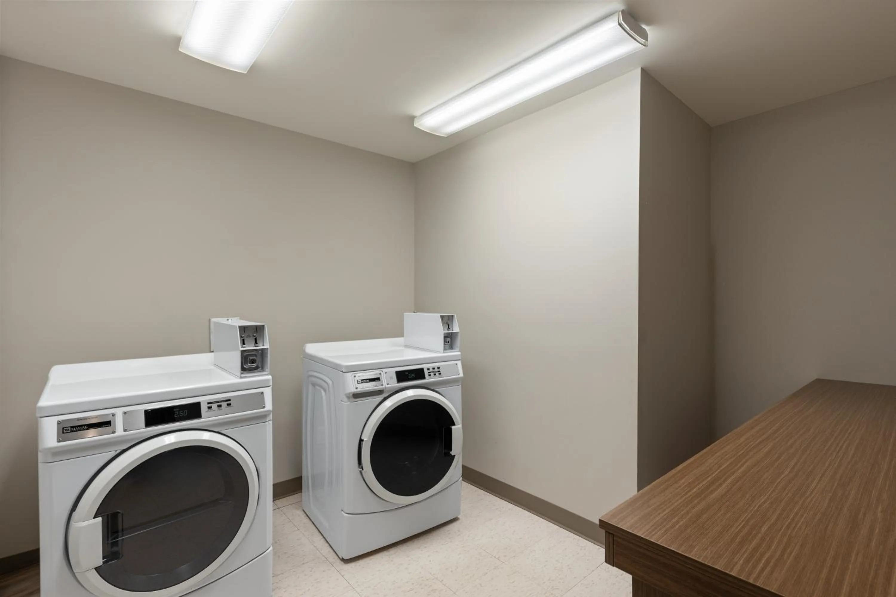 washing machine in Microtel Inn & Suites by Wyndham Kirkland Lake