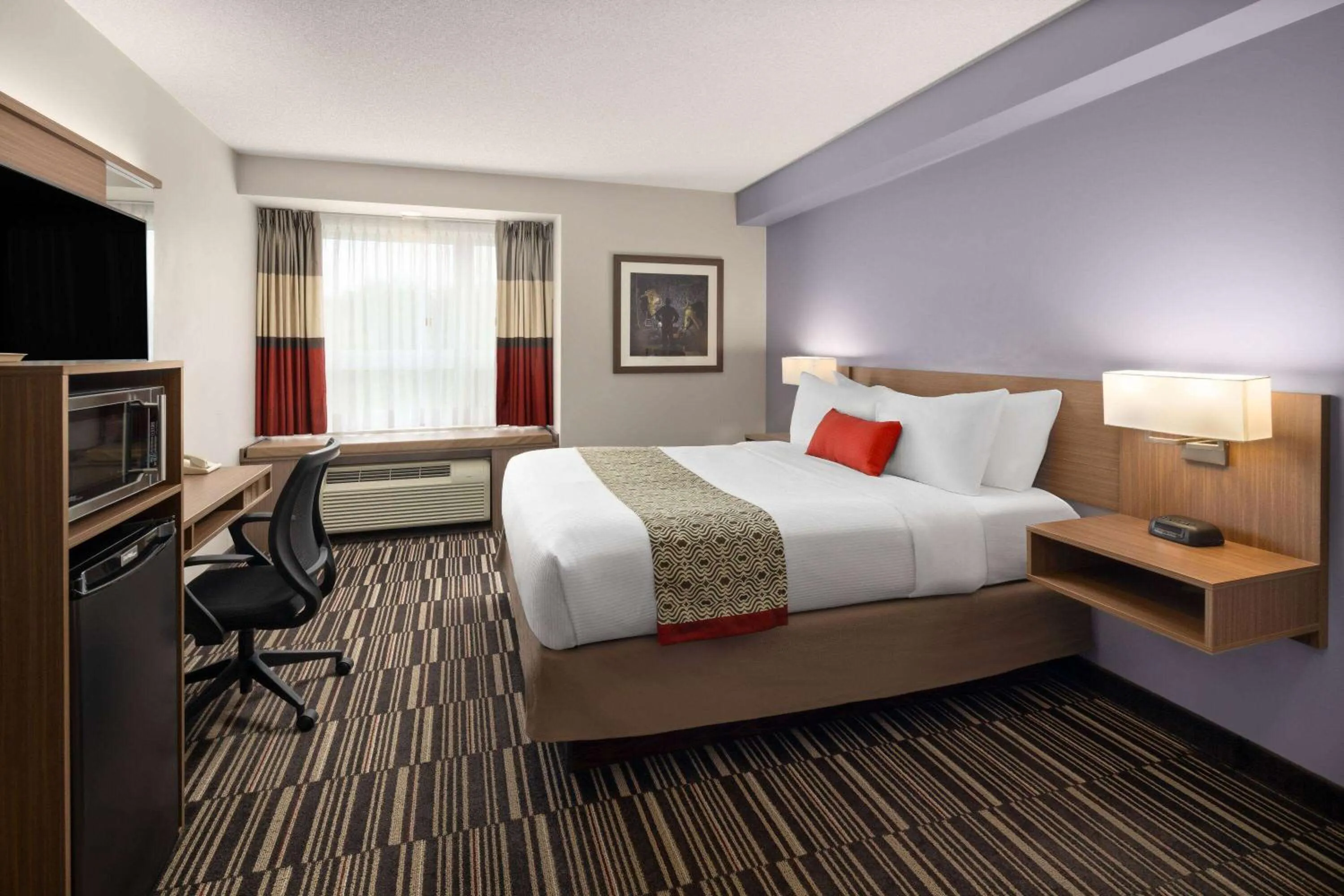 Photo of the whole room, Bed in Microtel Inn & Suites by Wyndham Kirkland Lake
