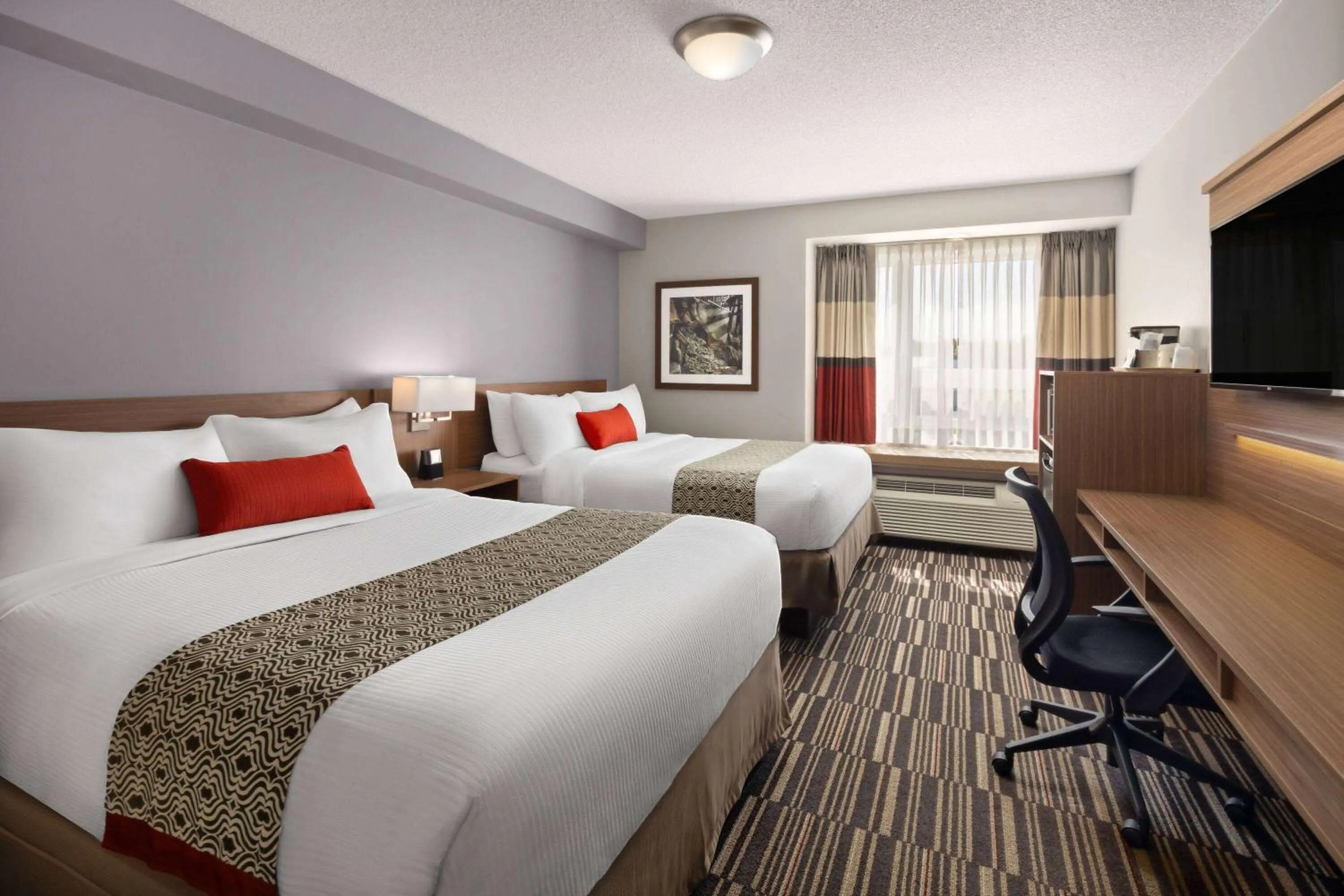 Photo of the whole room, Bed in Microtel Inn & Suites by Wyndham Kirkland Lake