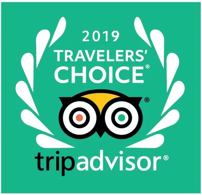 Property logo or sign in Books & Woods Bed and Breakfast