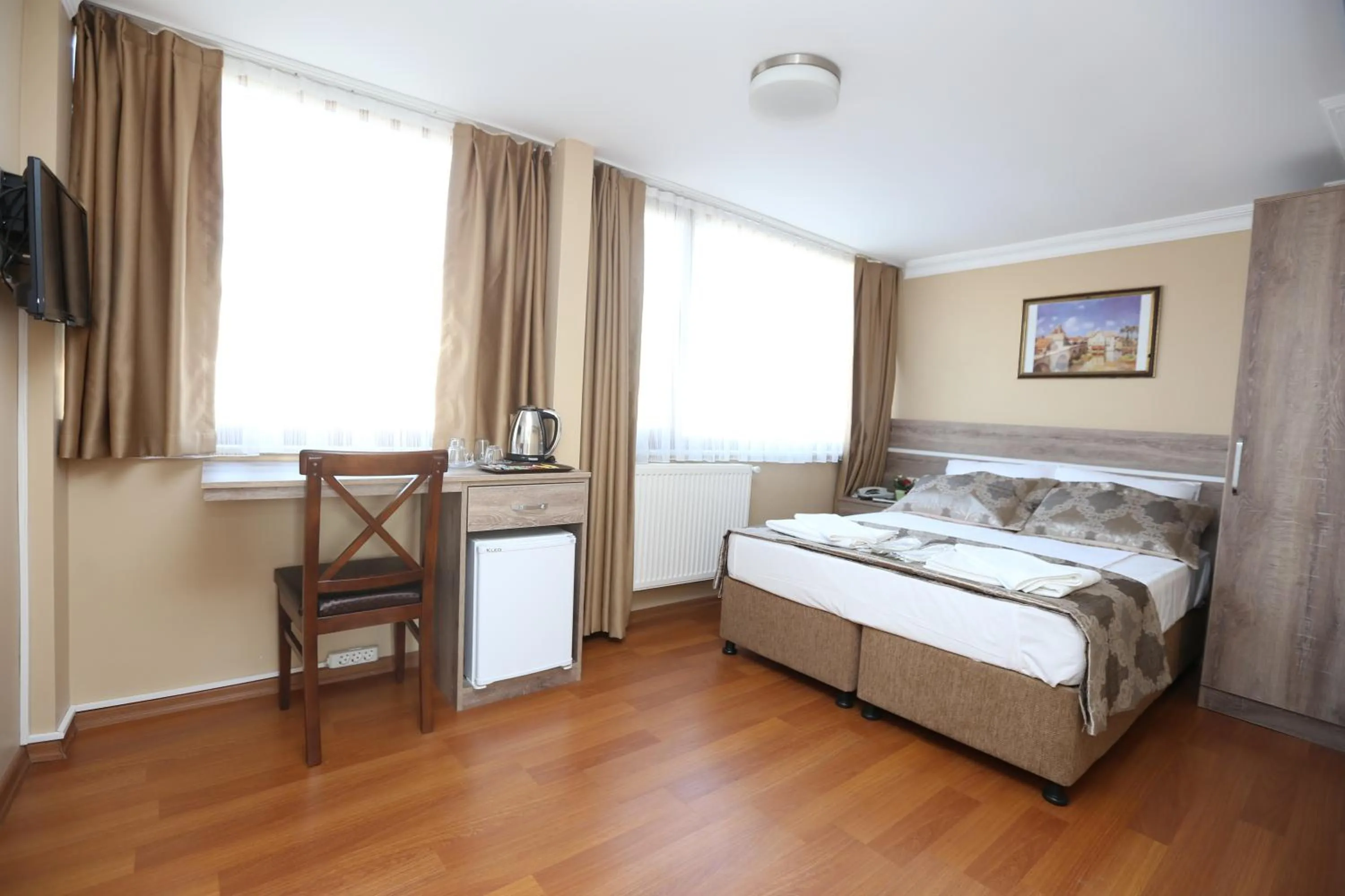 Bed in My Holiday Time Hotel