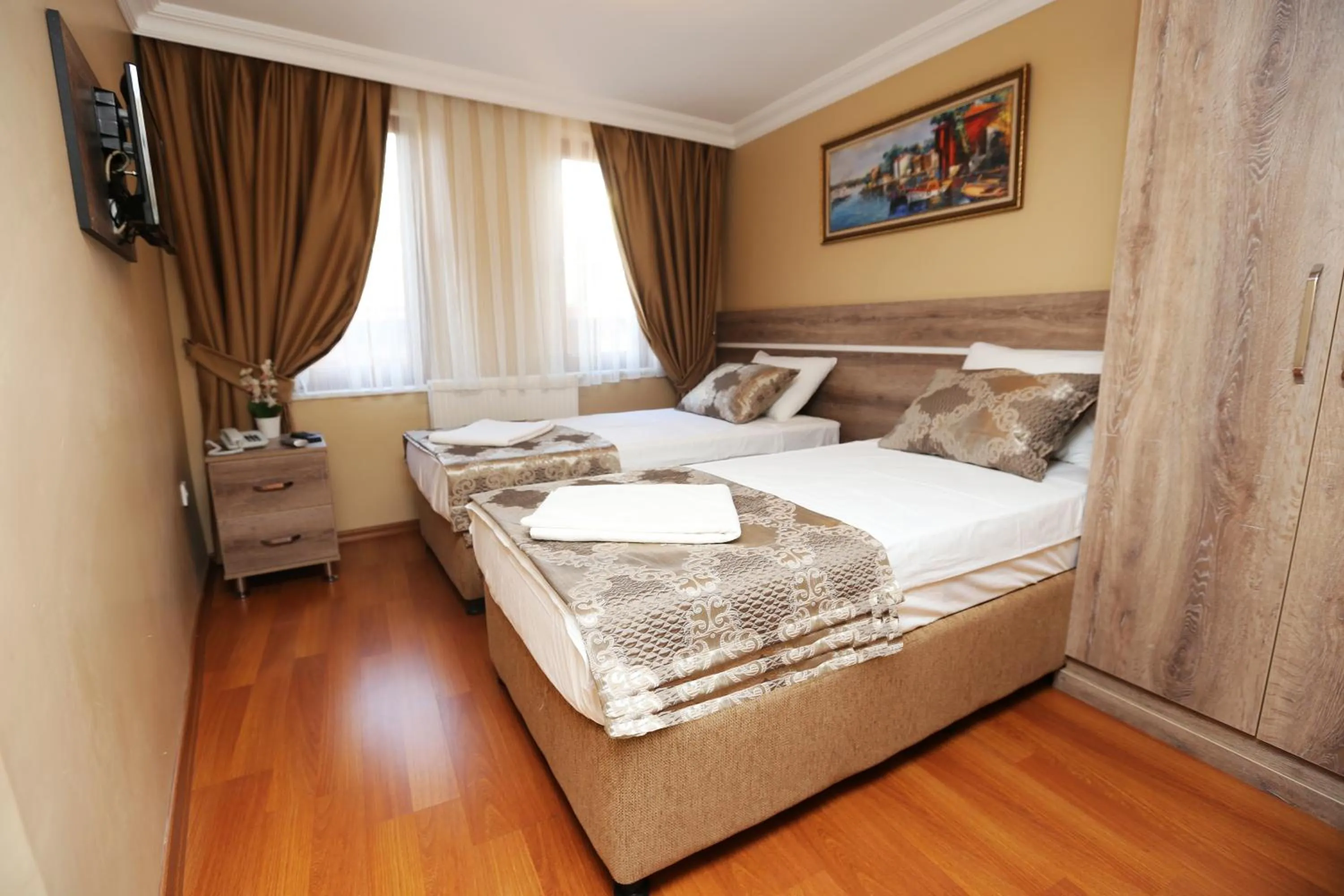 Bed in My Holiday Time Hotel