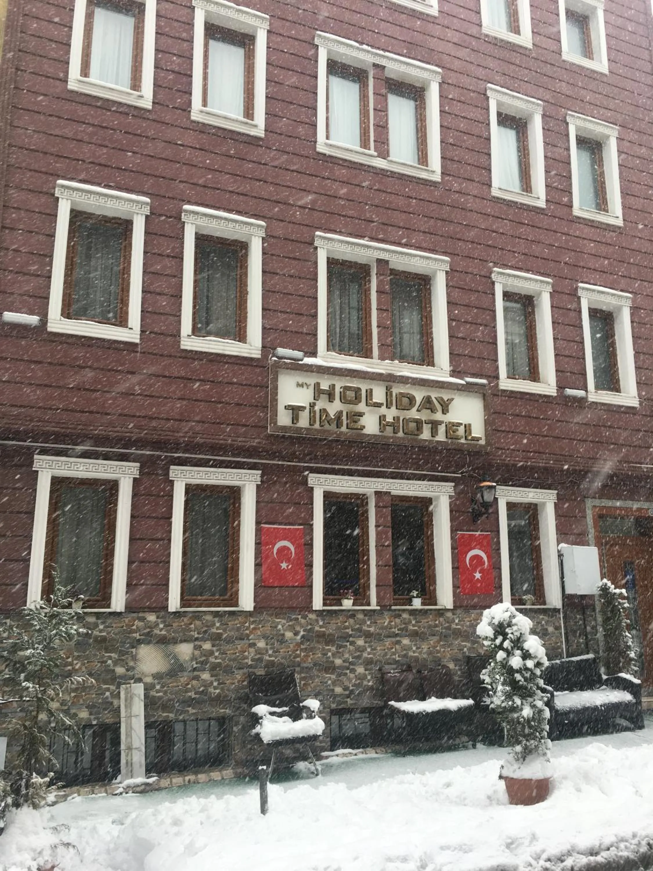 Property logo or sign in My Holiday Time Hotel