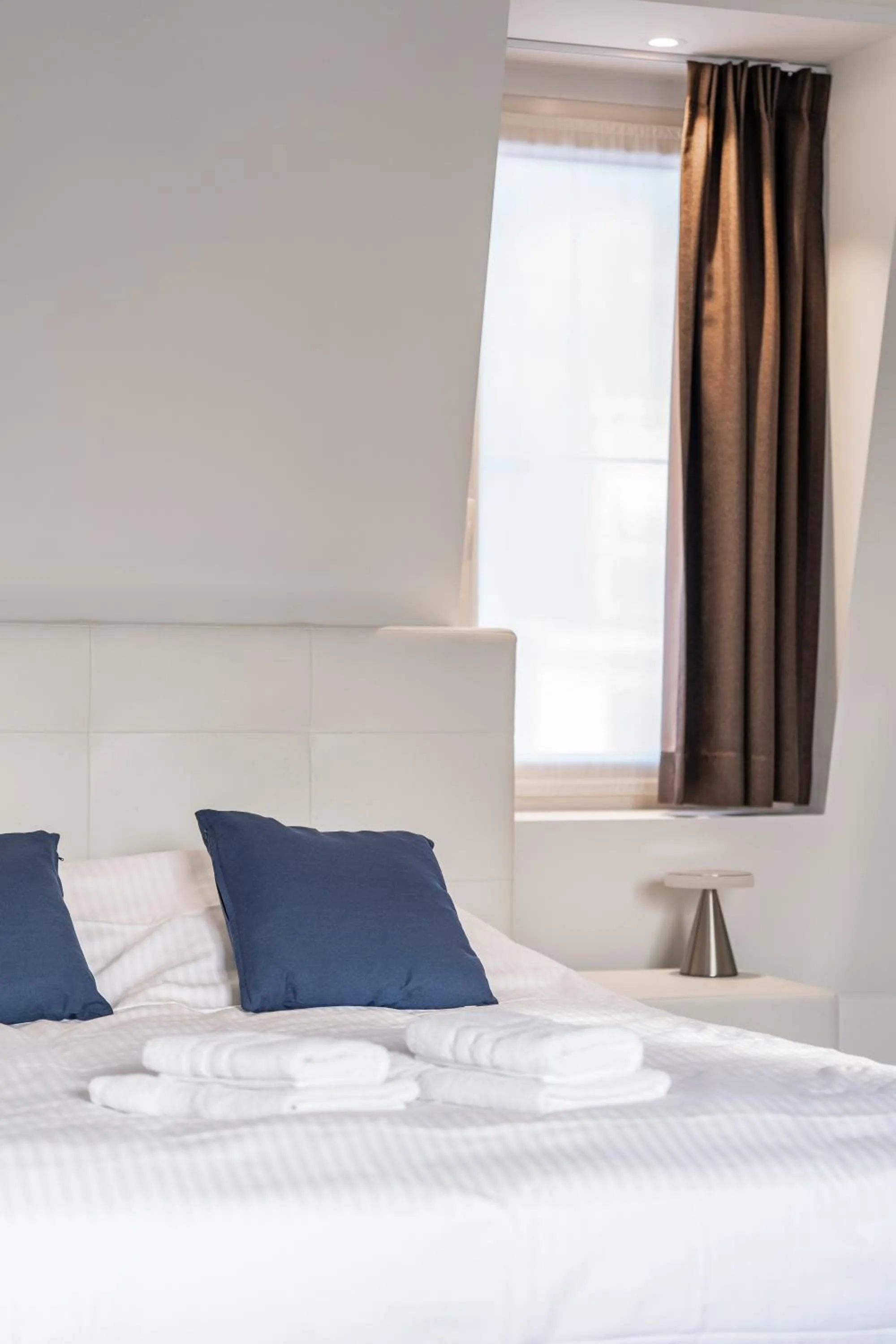 Bed in Maison Bruges