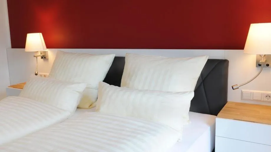 Bed in Hotel Am Markt