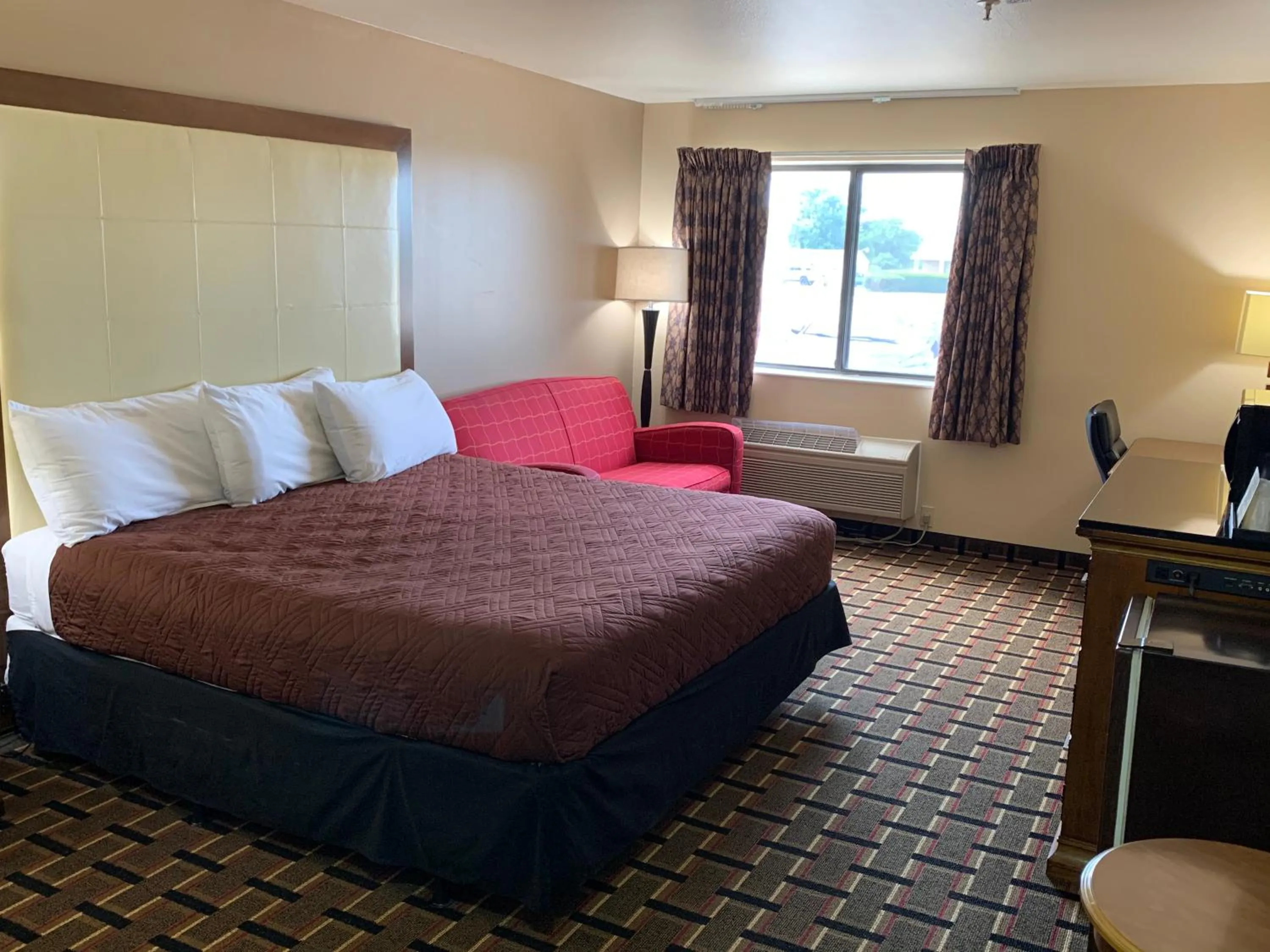 Bed in Heritage Grand Inn