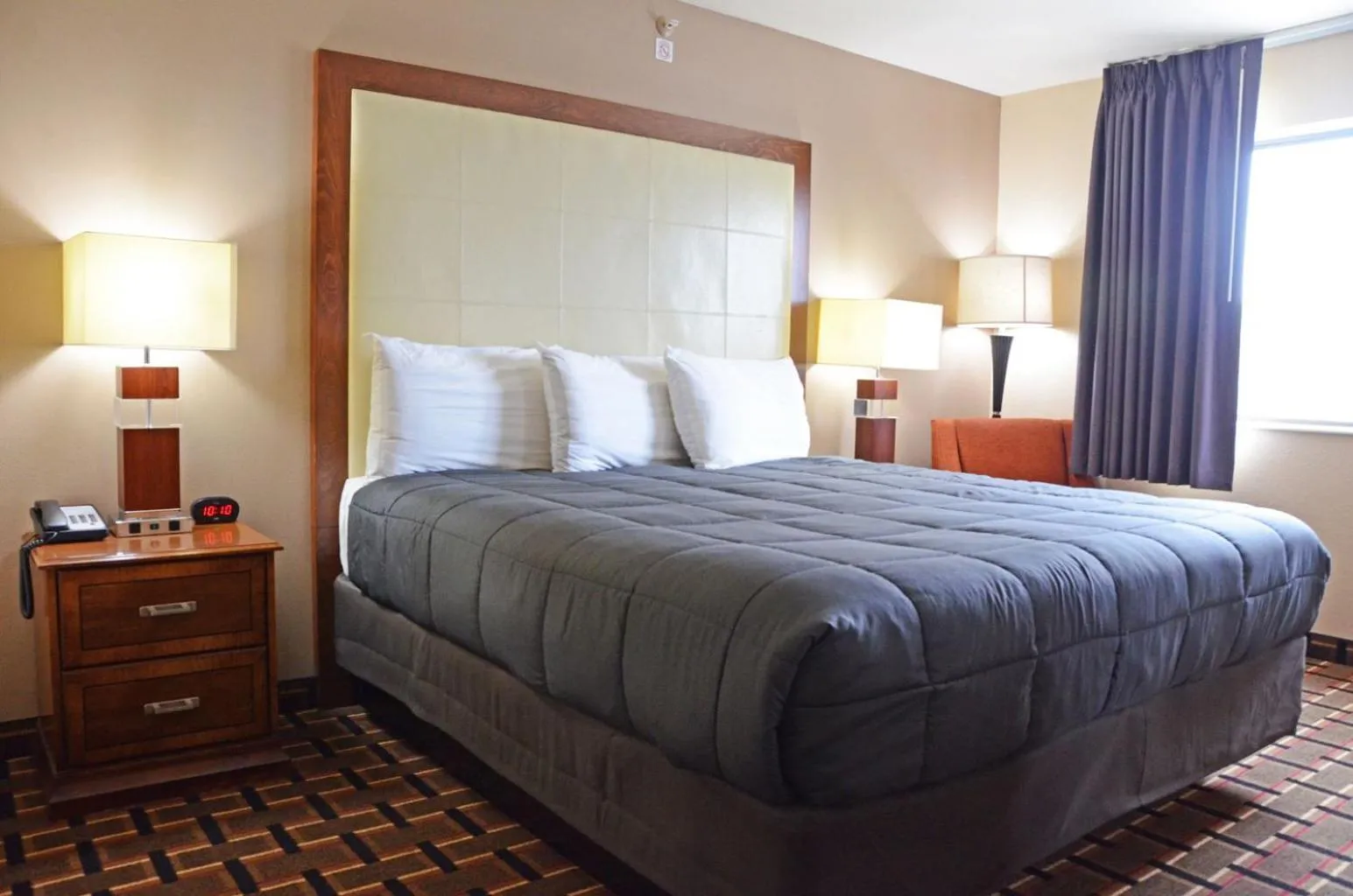 Bed in Heritage Grand Inn