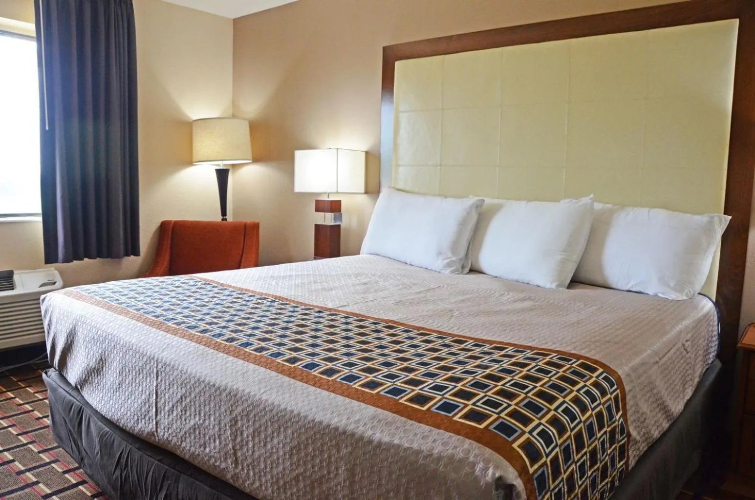 Bed in Heritage Grand Inn