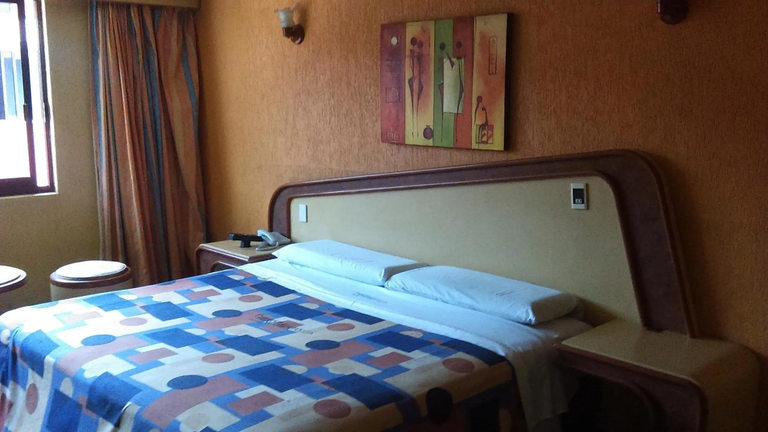 Bed in Hotel Aeropuerto