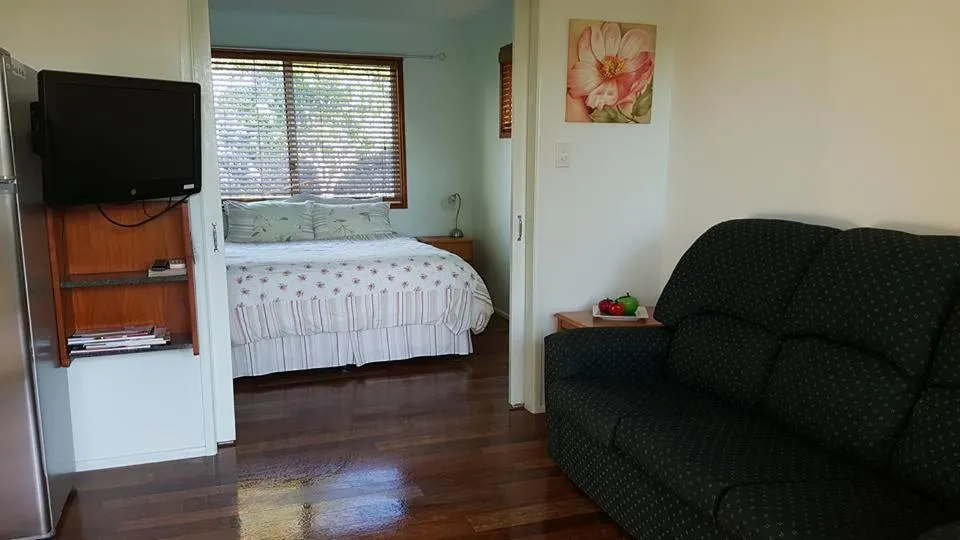 Living room, Bed in Amamoor Homestead and Country Cottages